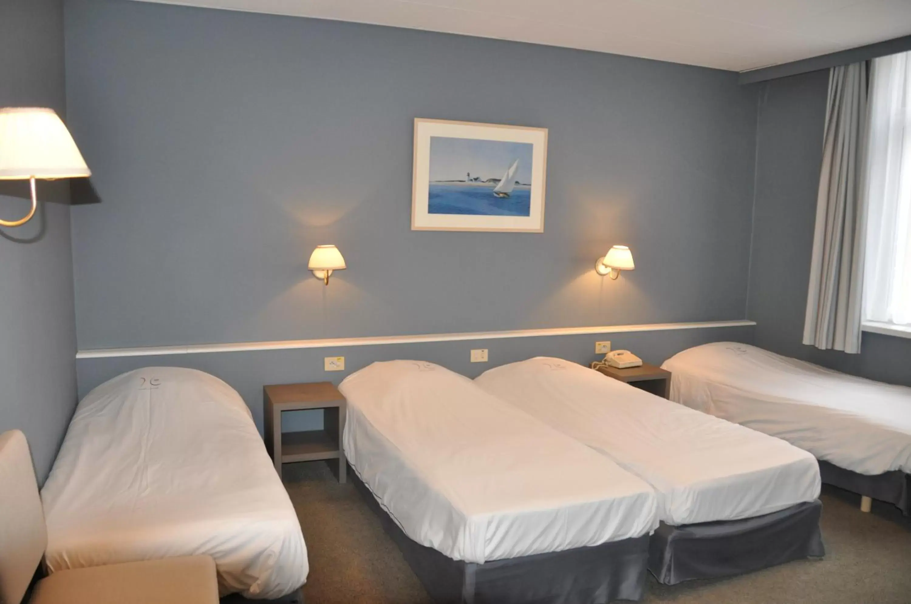 Standard Quadruple Room in Hotel Louisa Standard Quadruple Room in Hotel Louisa