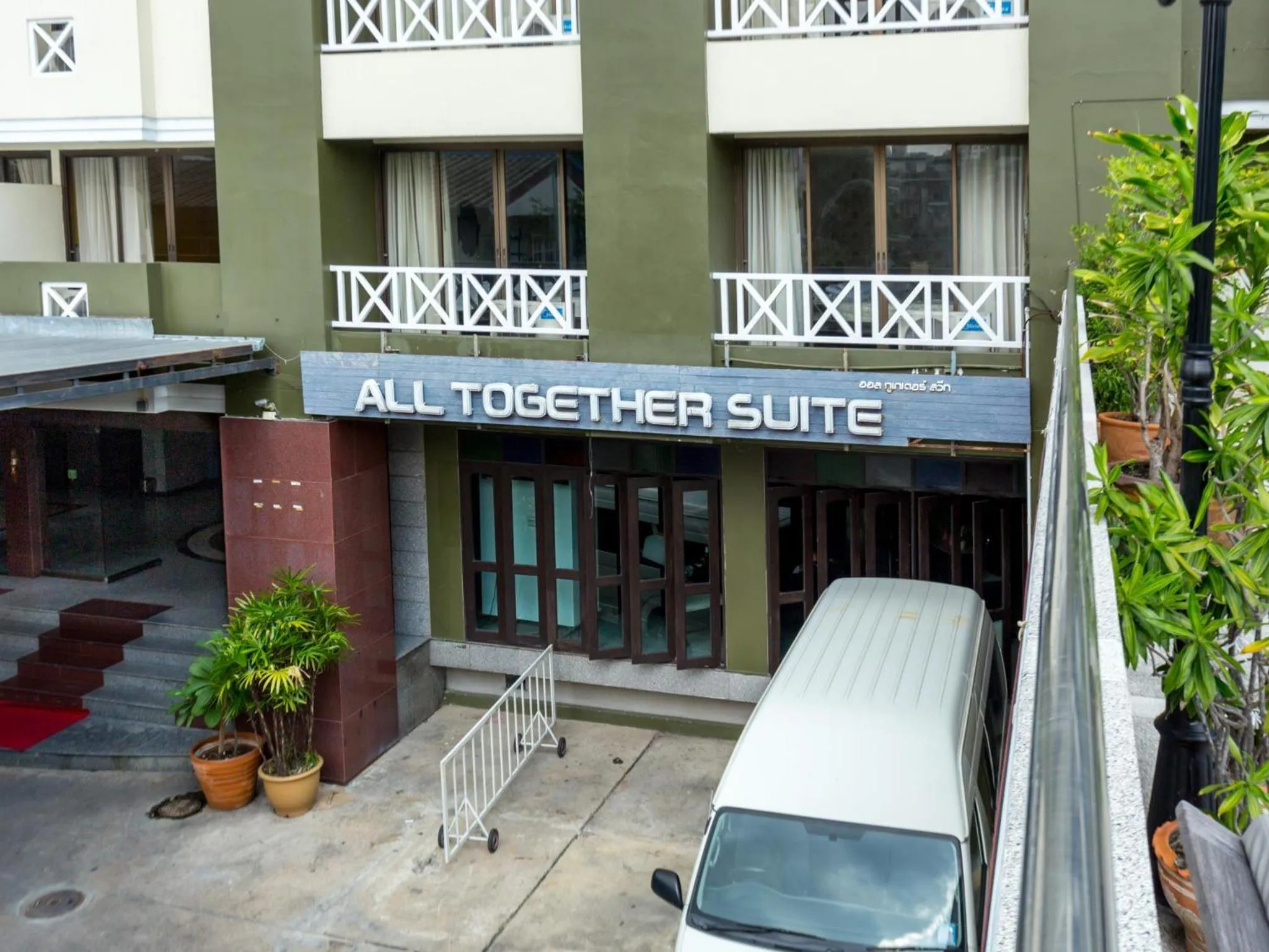 Property logo or sign in All Together Suite Hotel