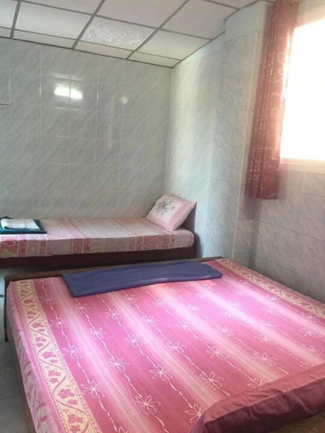 Bed in New Central Guesthouse