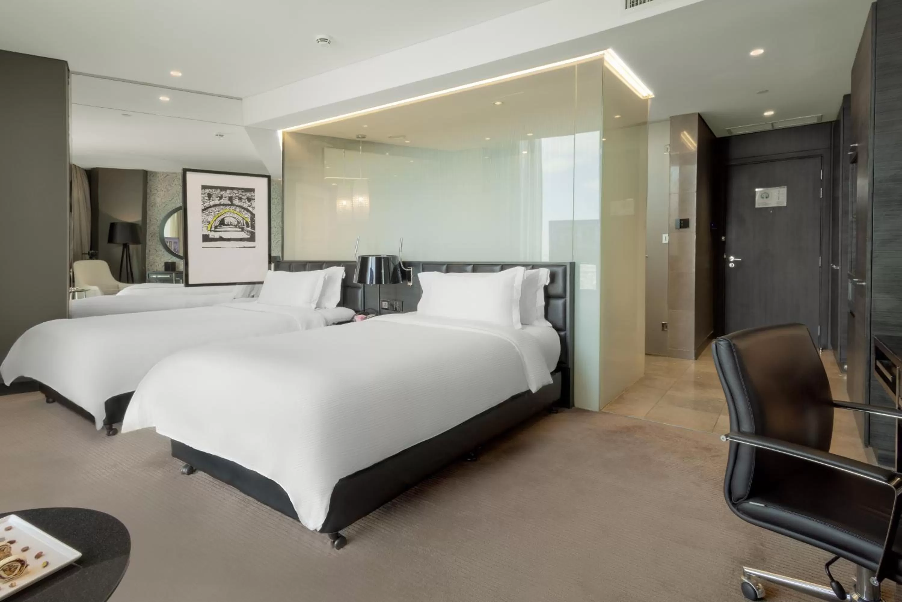 Photo of the whole room, Bed in Amman Rotana