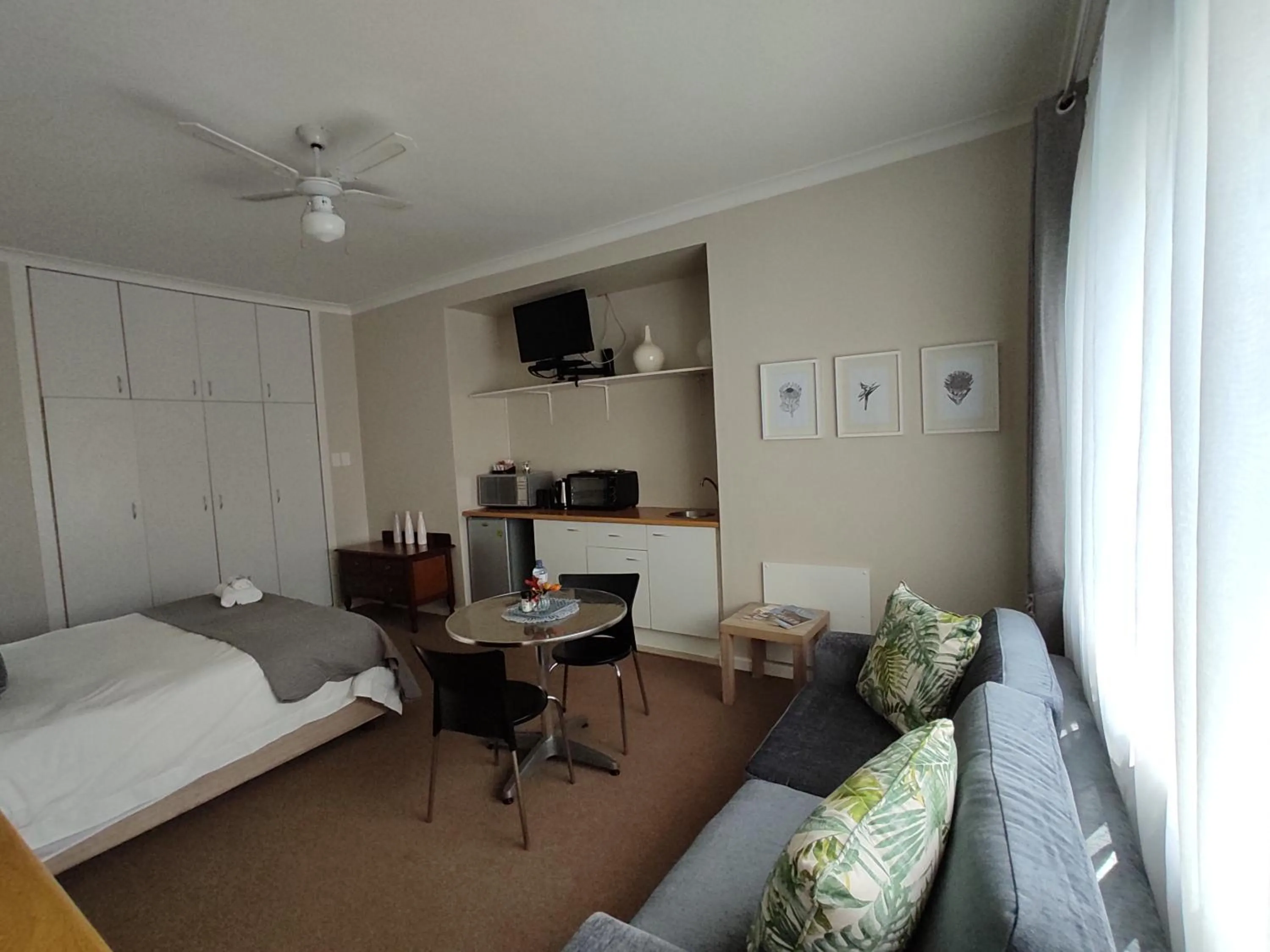 Bed in Palm Beach Guesthouse