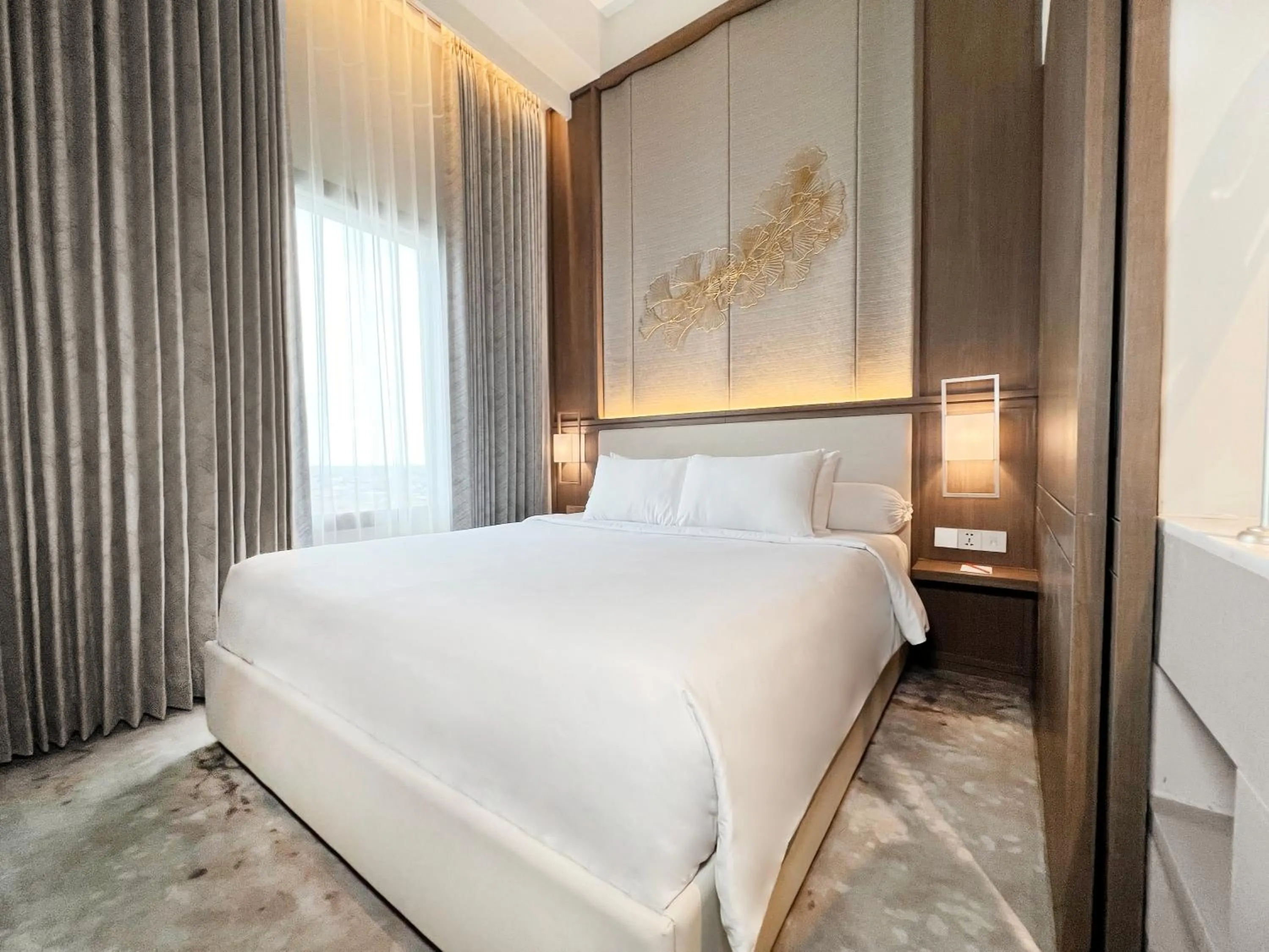 Bed in HARRIS Hotel & Conventions Gubeng