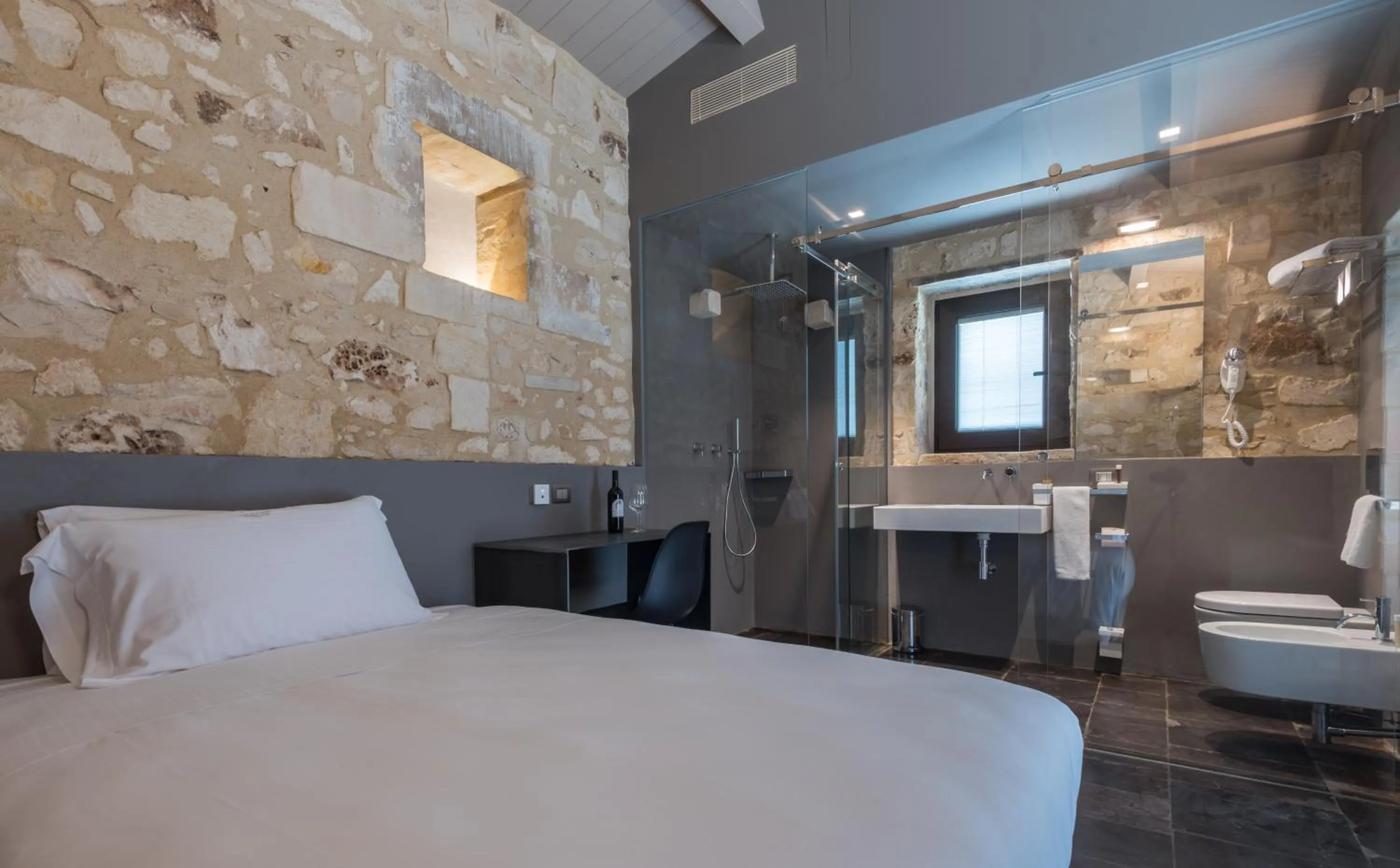 Photo of the whole room, Bed in Villa Boscarino Boutique Hotel & Spa