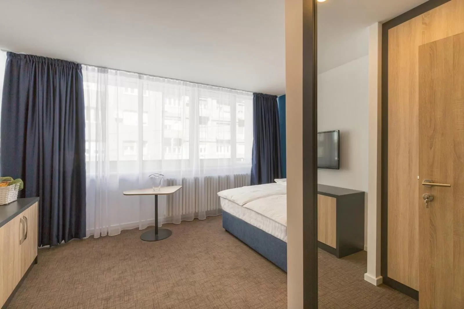 Bedroom, Bed in Premium Crown Suites