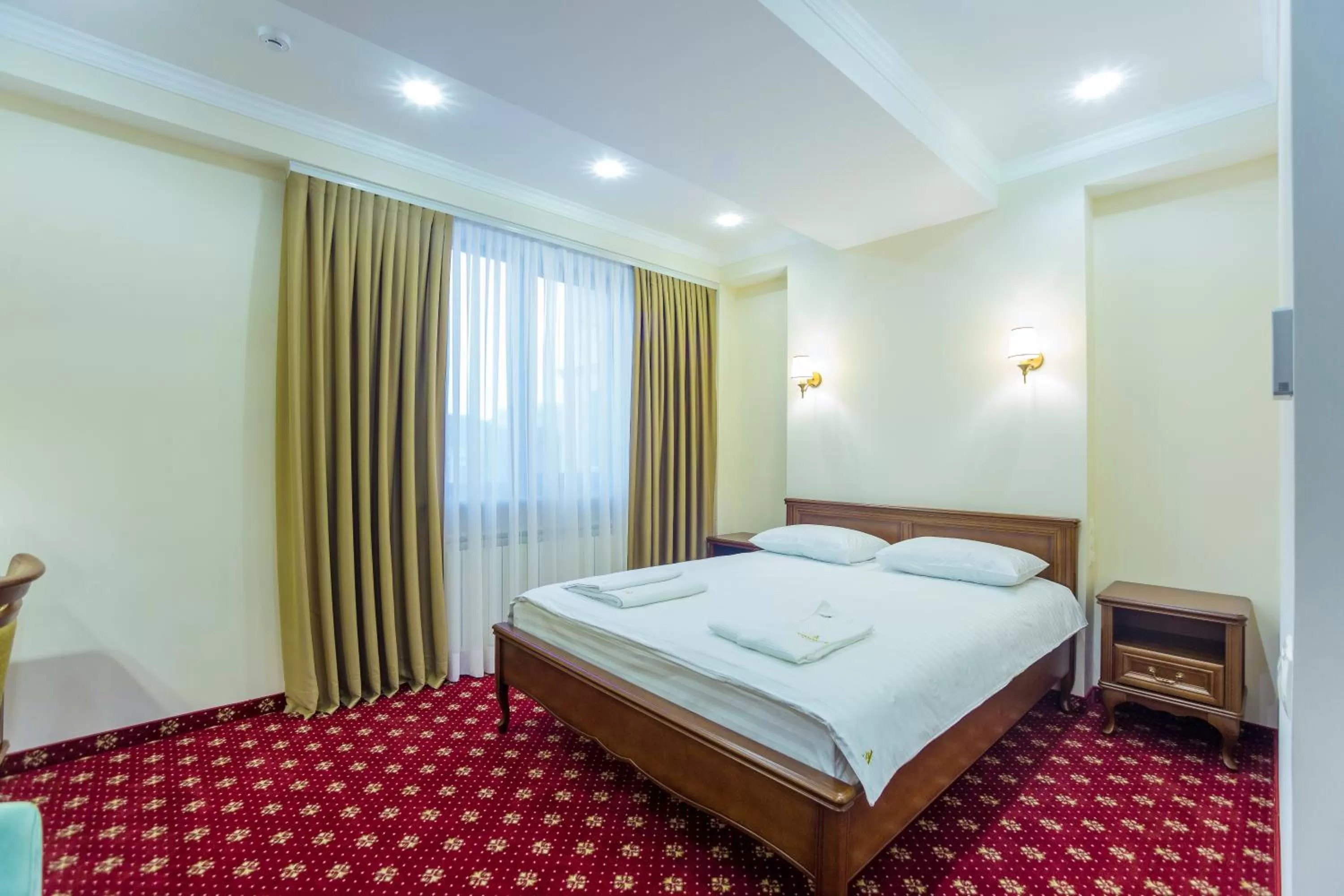 Photo of the whole room, Bed in Ambassador Hotel