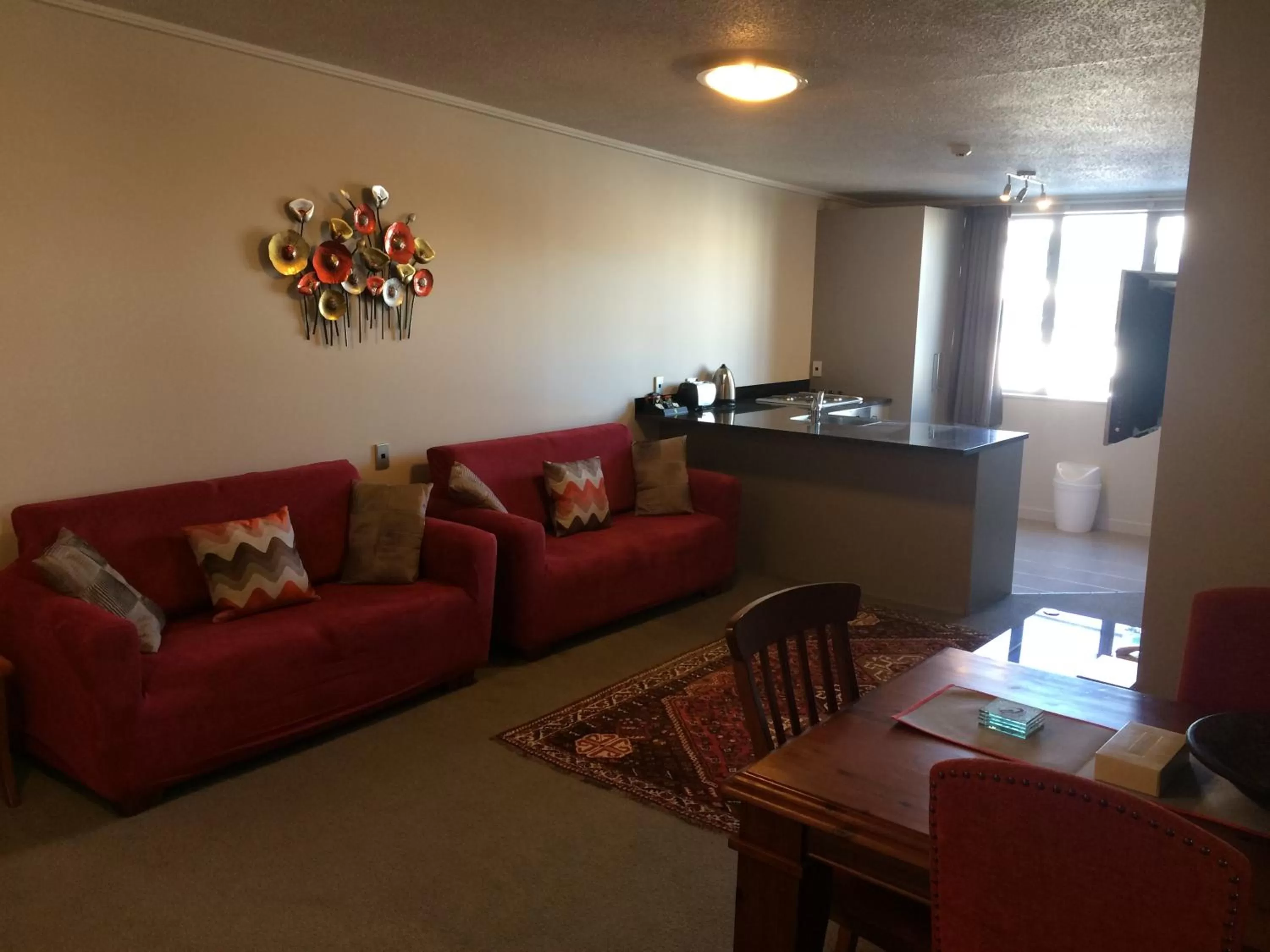 Communal lounge/ TV room in City Central Motel Apartments