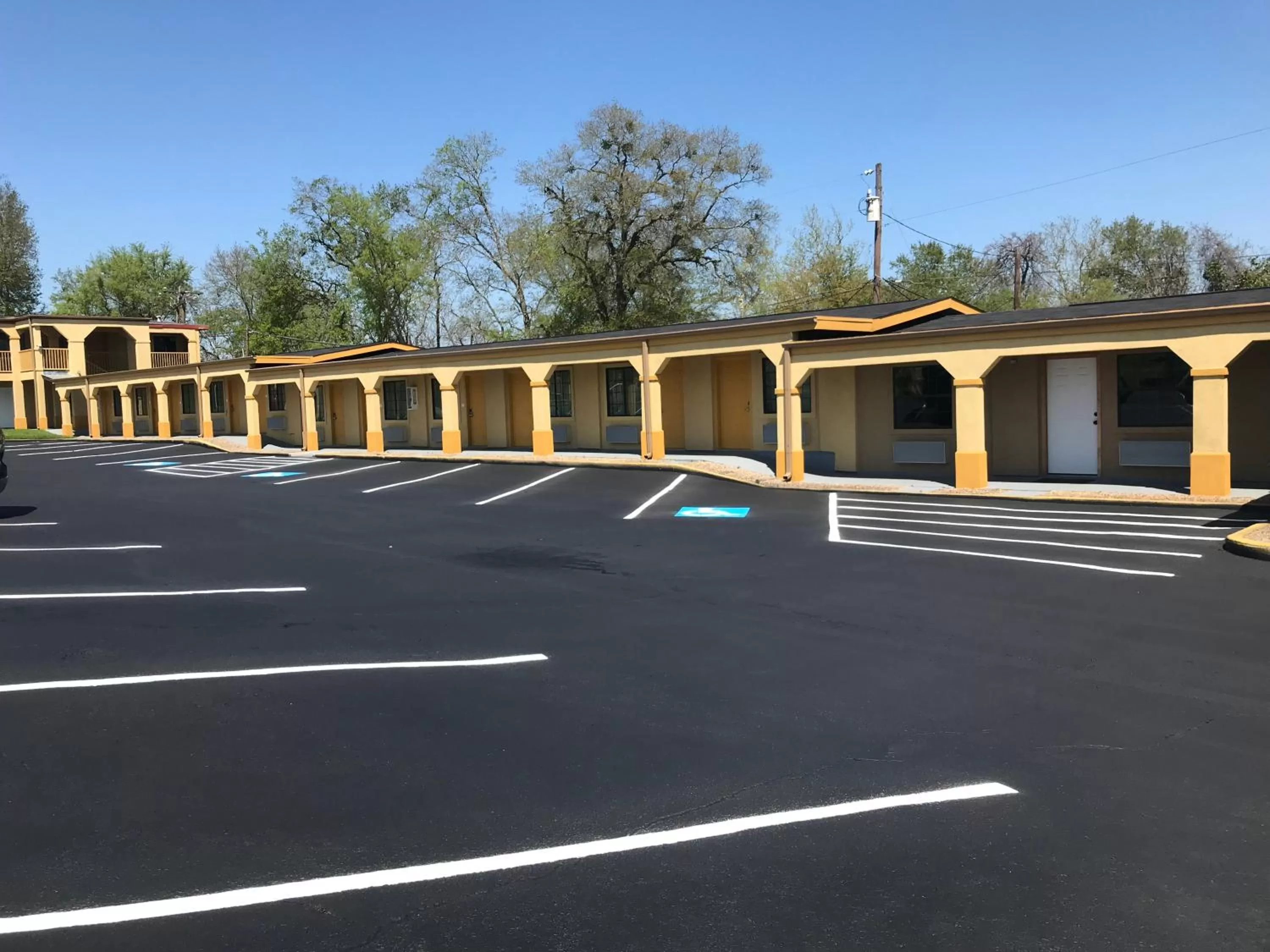 Property building in Super 8 by Wyndham Palestine TX