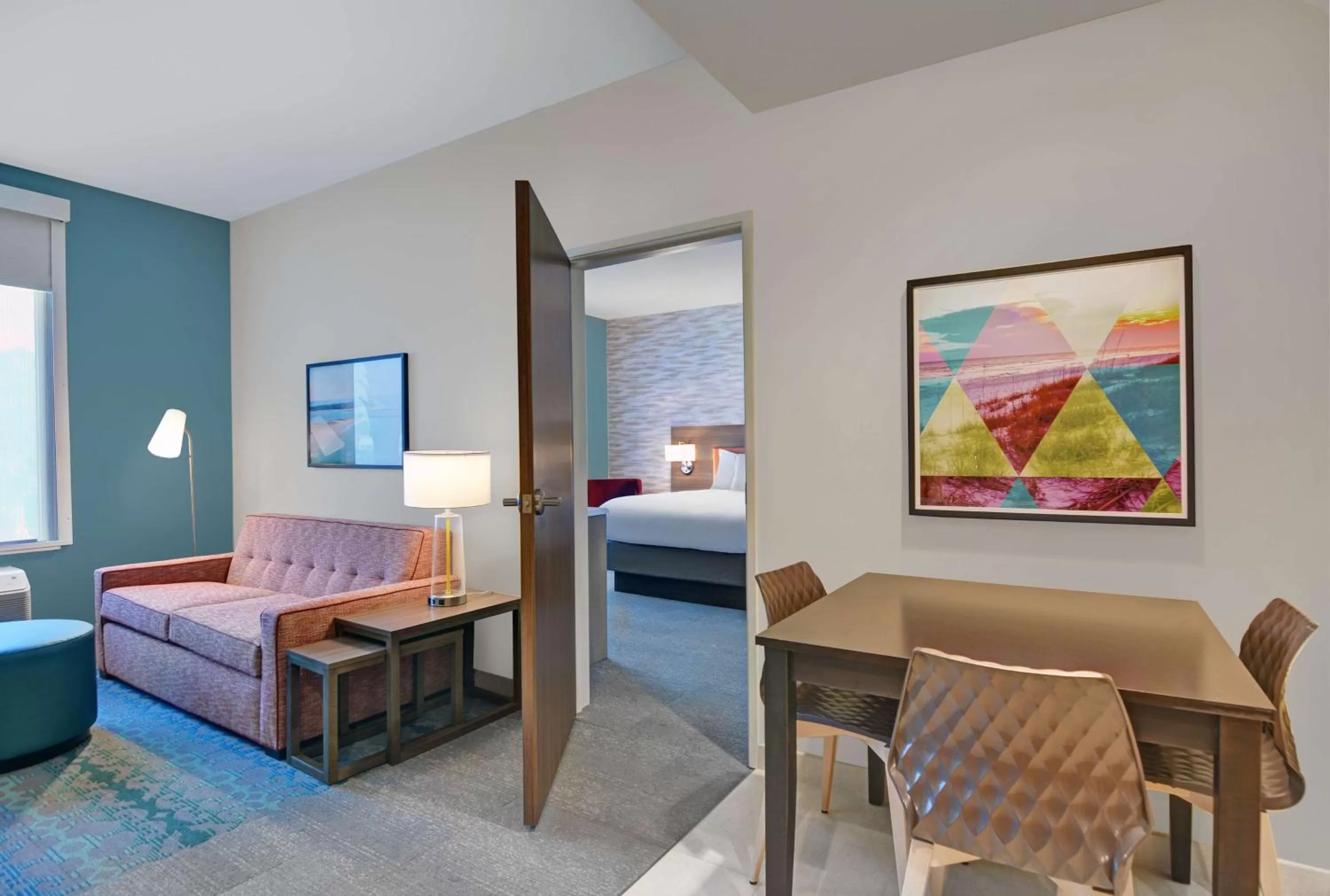 Living room, Bed in Home2 Suites By Hilton Panama City Beach, Fl