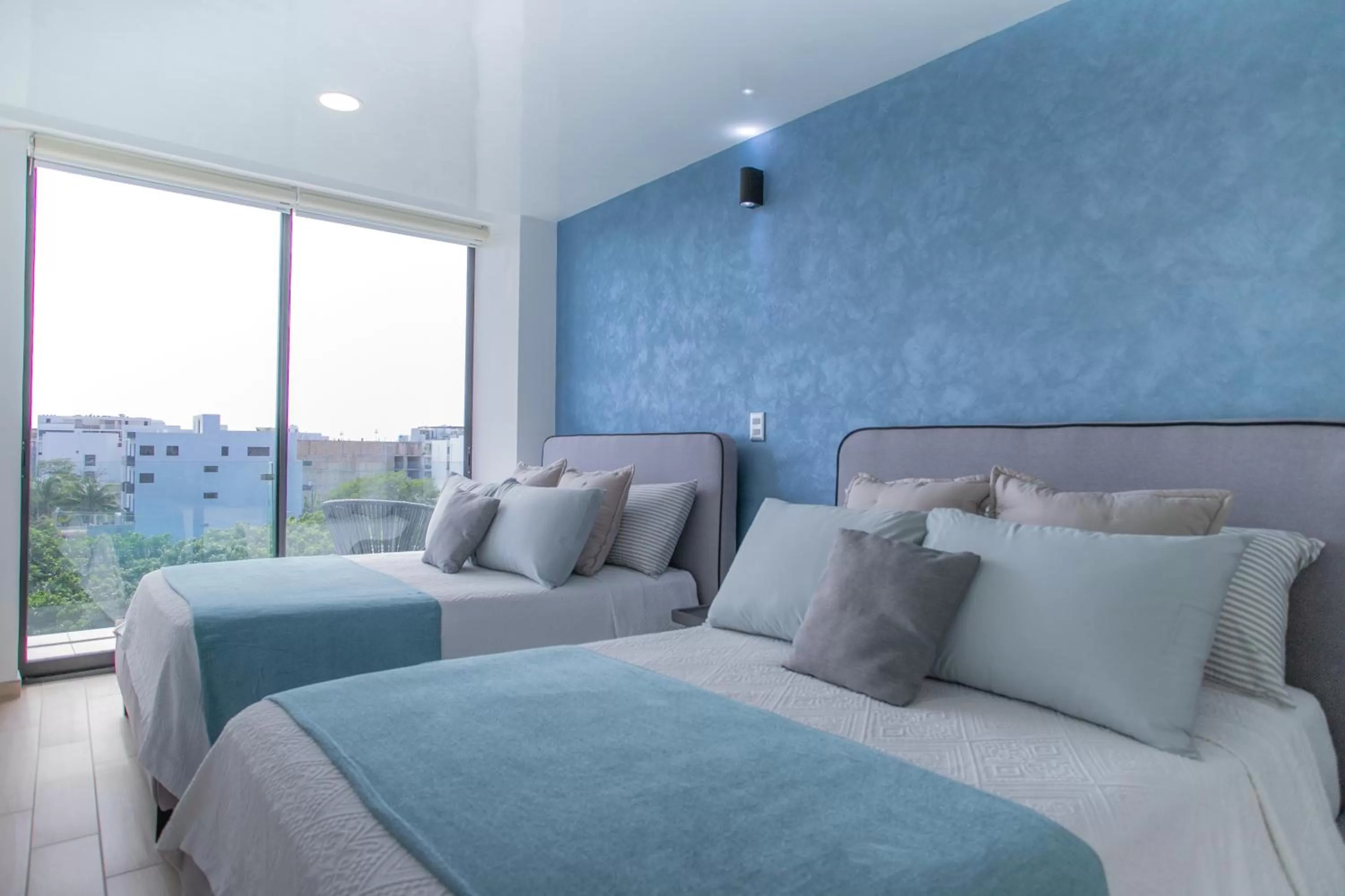 Photo of the whole room, Bed in Macondo Quinta Avenida Residences