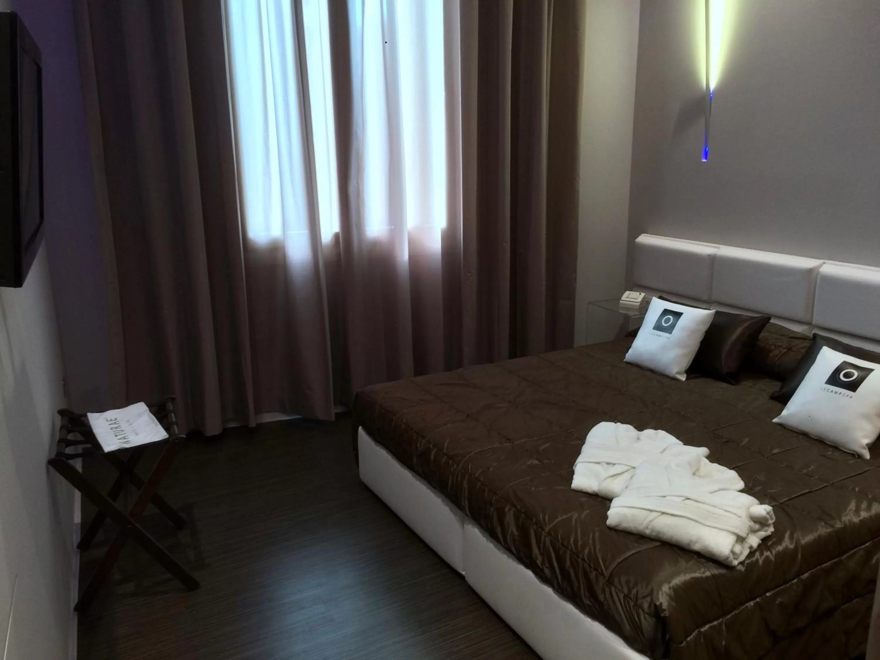 Bed in Le Camp Suite & Spa