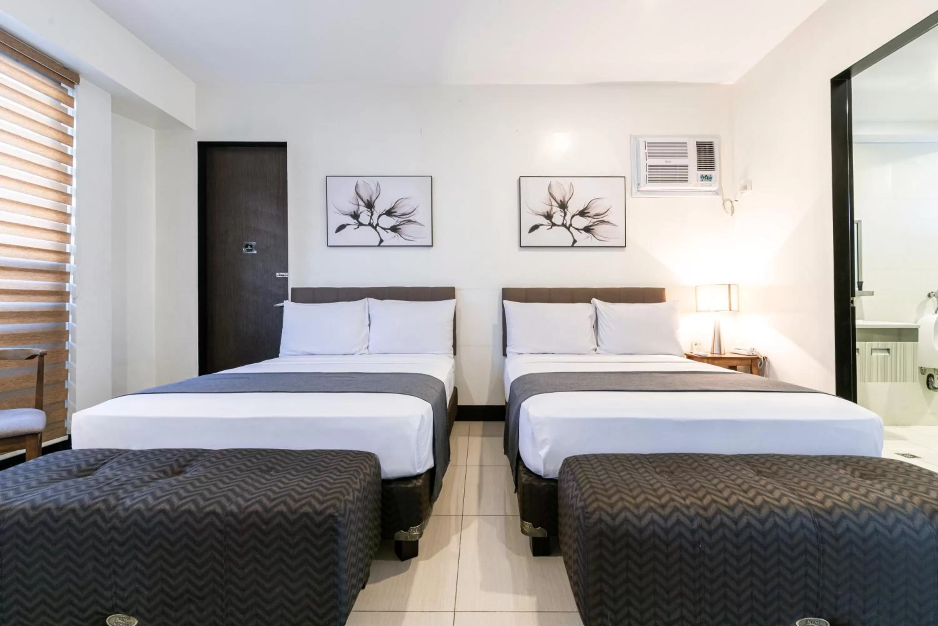 Bedroom, Bed in Artemis Place Makati Hotel