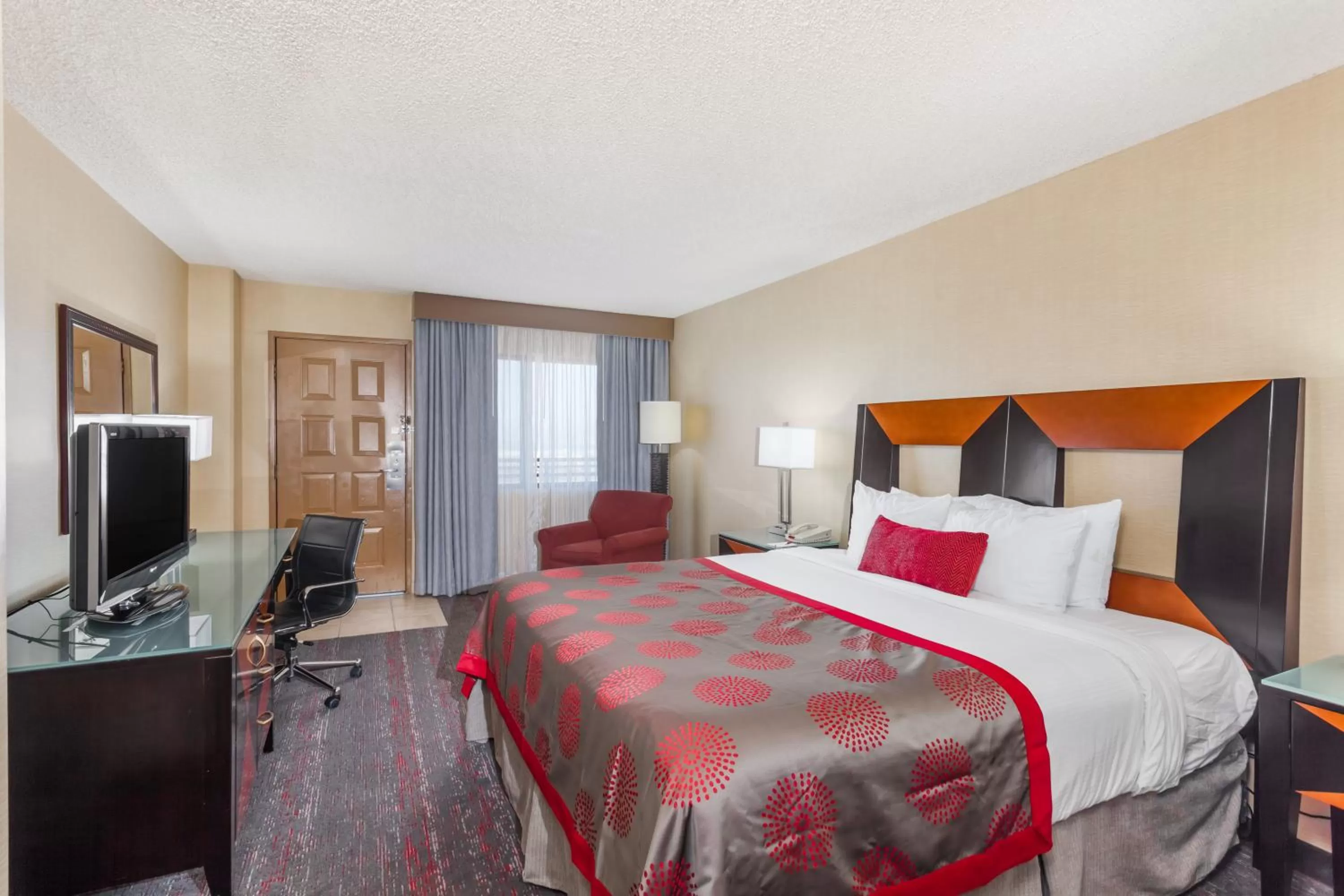 Photo of the whole room, Bed in Ramada by Wyndham San Diego National City
