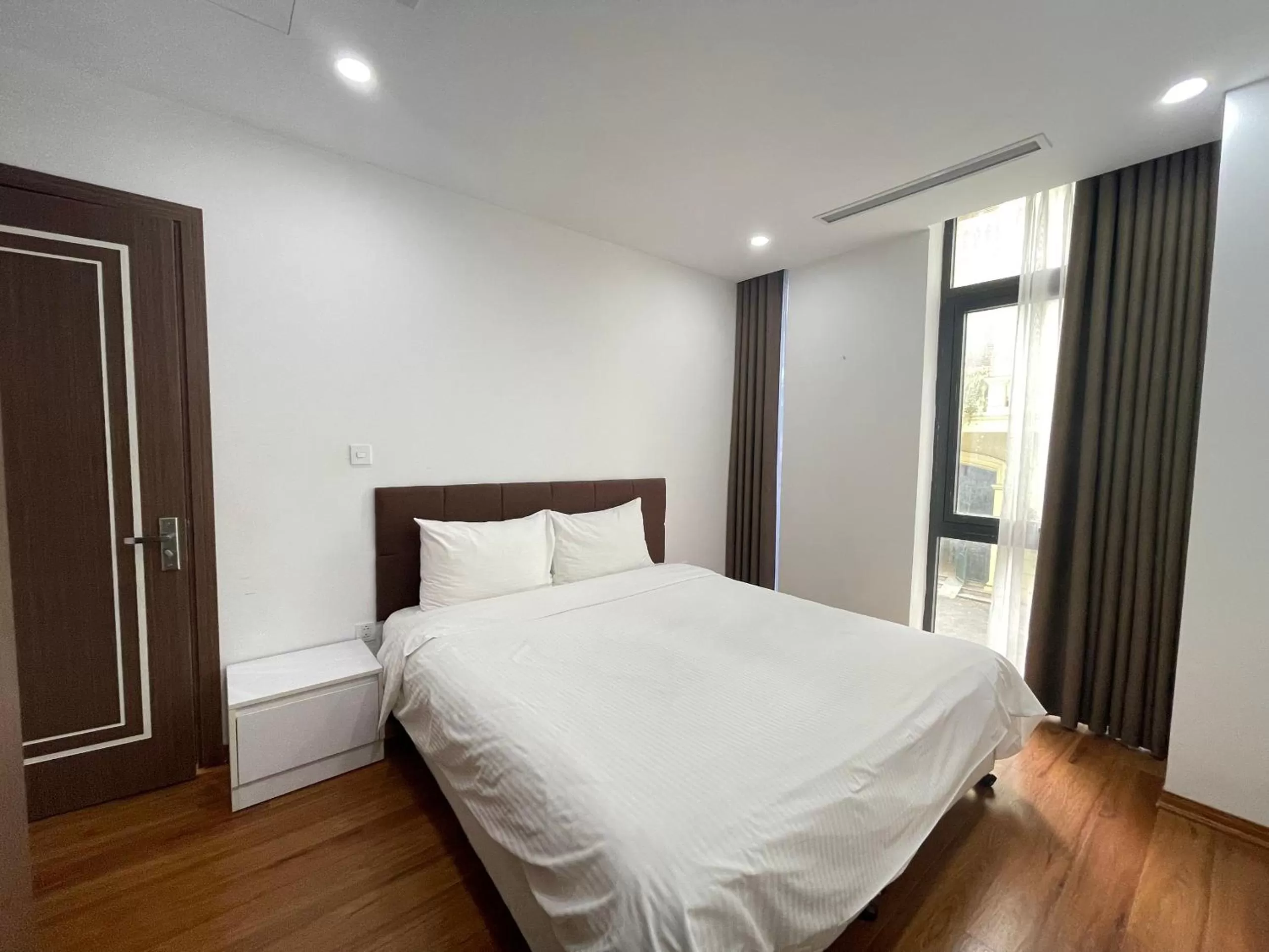 Bed in HNC Premier Hotel & Residences