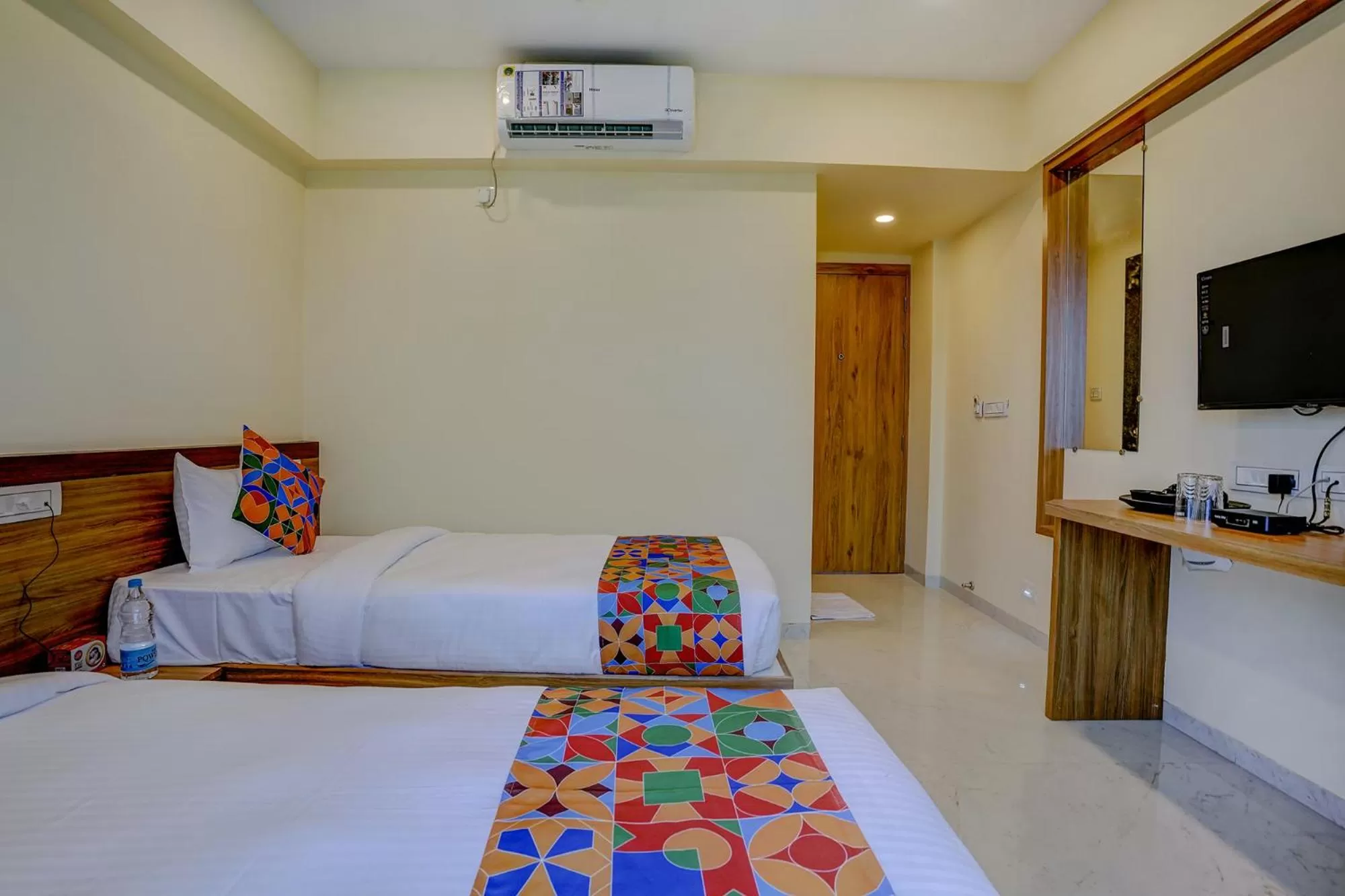 Bed in FabHotel Crystal Homes - nr Rajaram Bhiku stadium