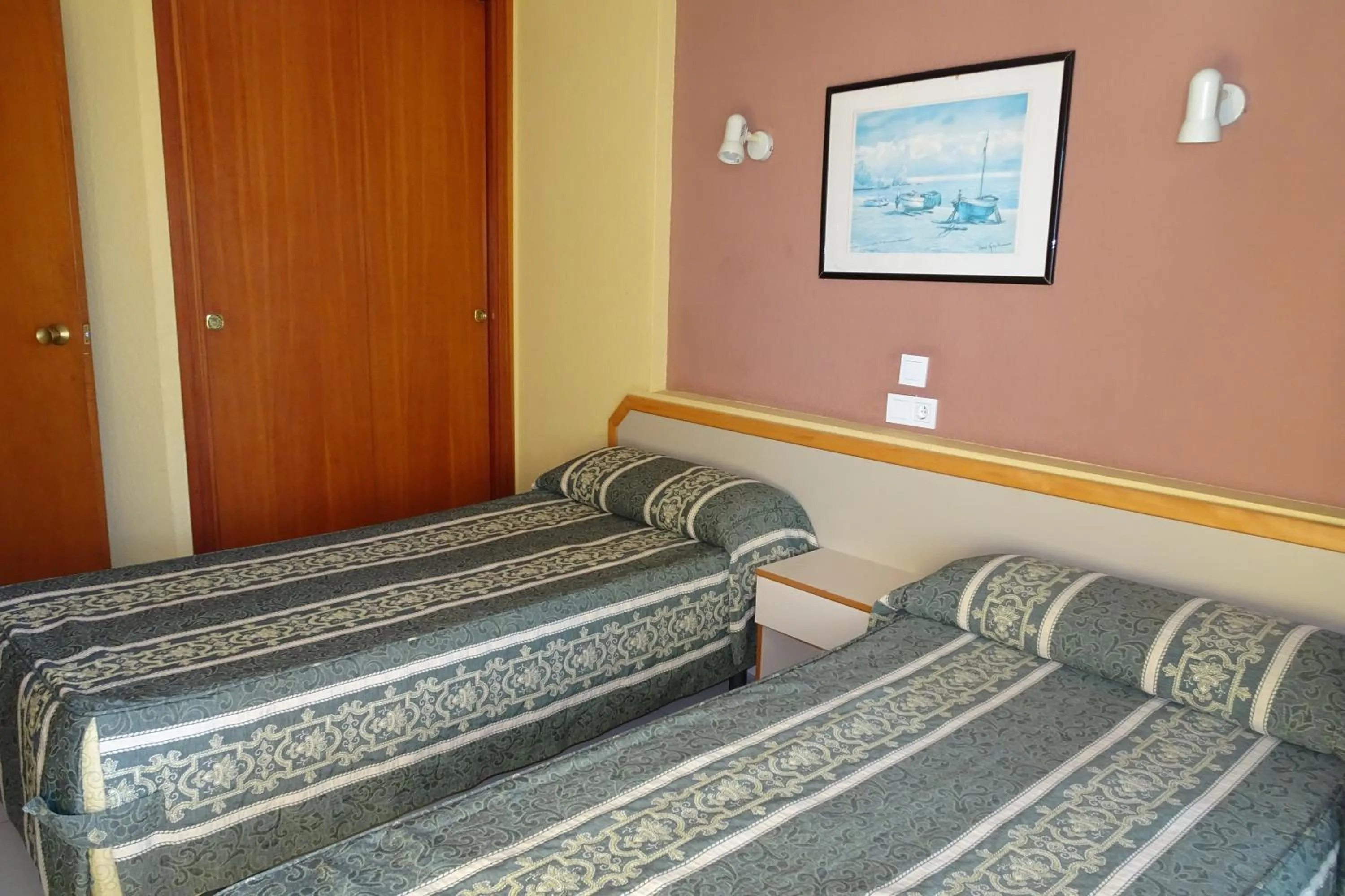 Bed in Luxmar Apartaments