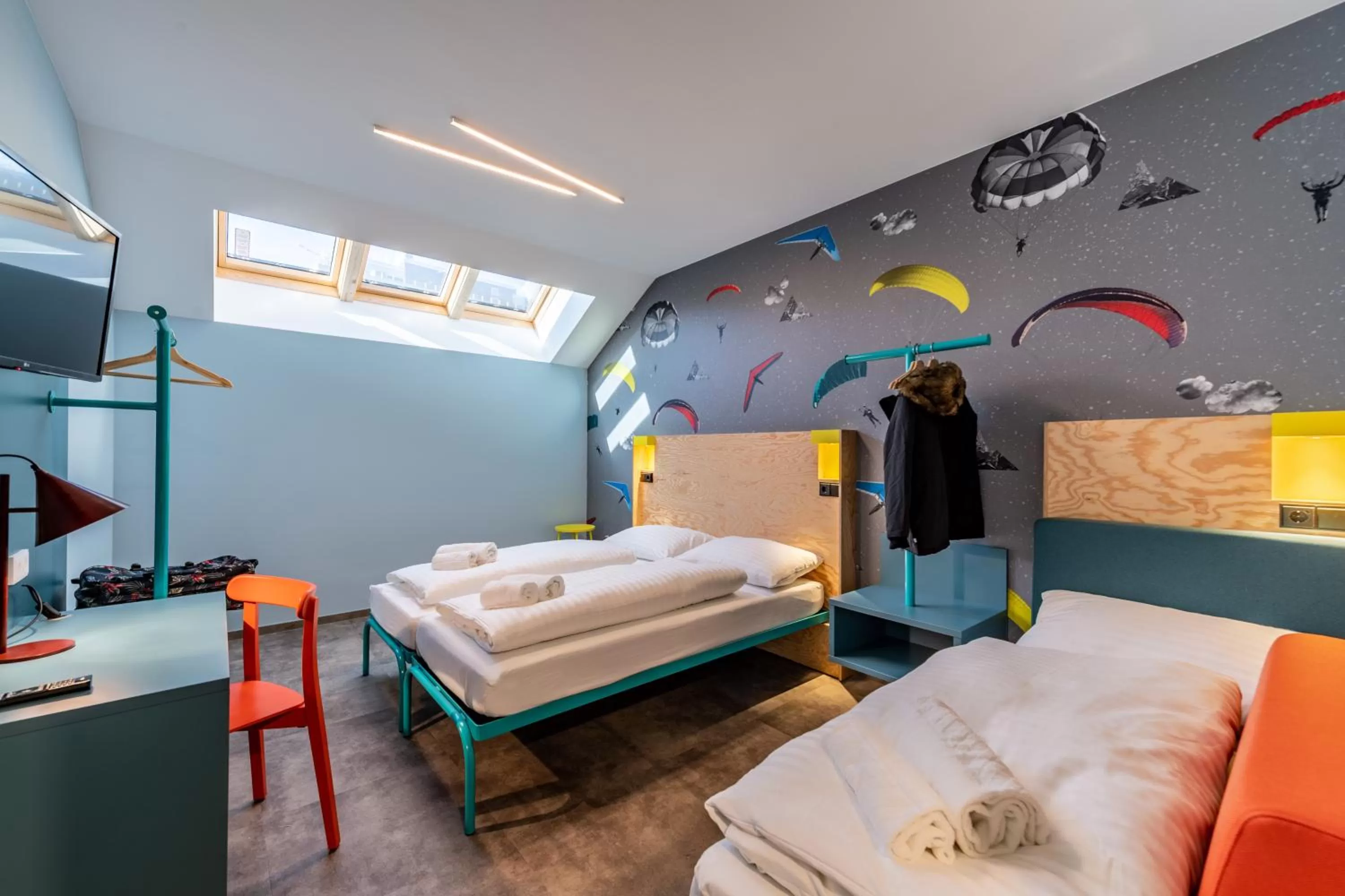 Photo of the whole room, Bed in MEININGER Hotel Innsbruck Zentrum