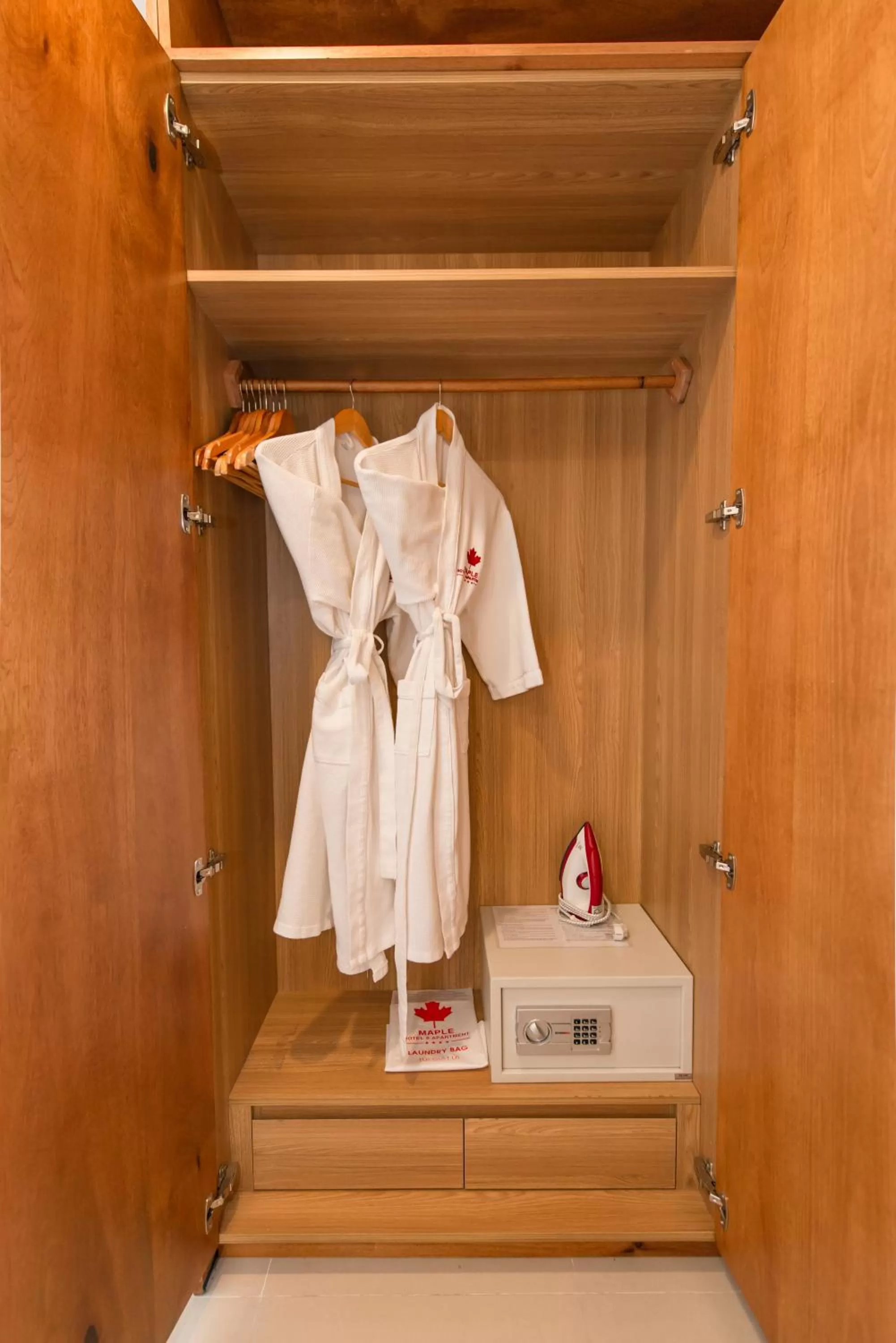 wardrobe in Maple Hotel & Apartment