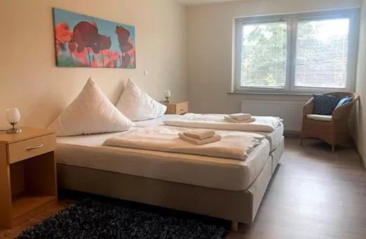 Bedroom, Bed in Bernsteinsee Hotel&Ferien