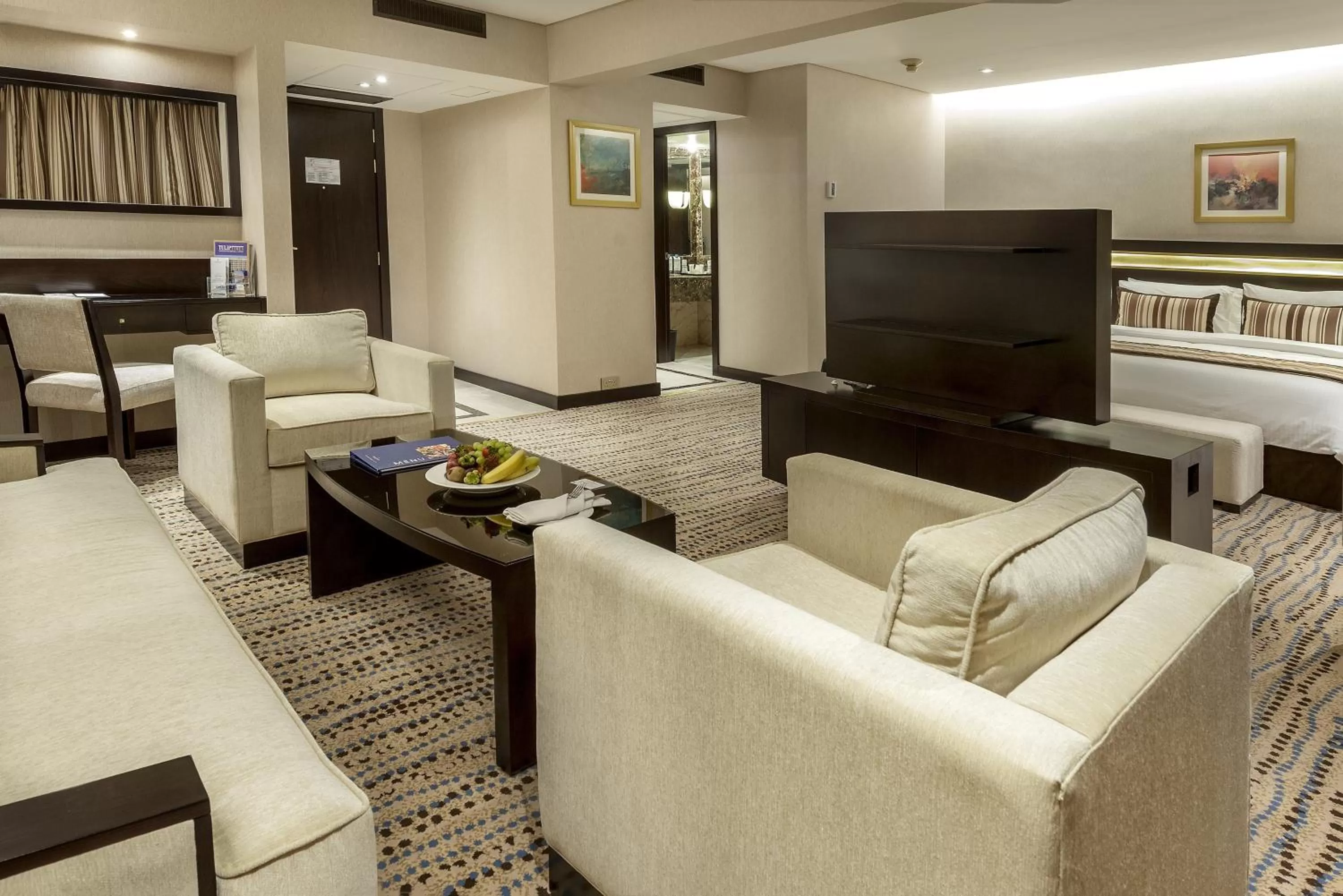 Living room, Bed in Golden Tulip Bahrain