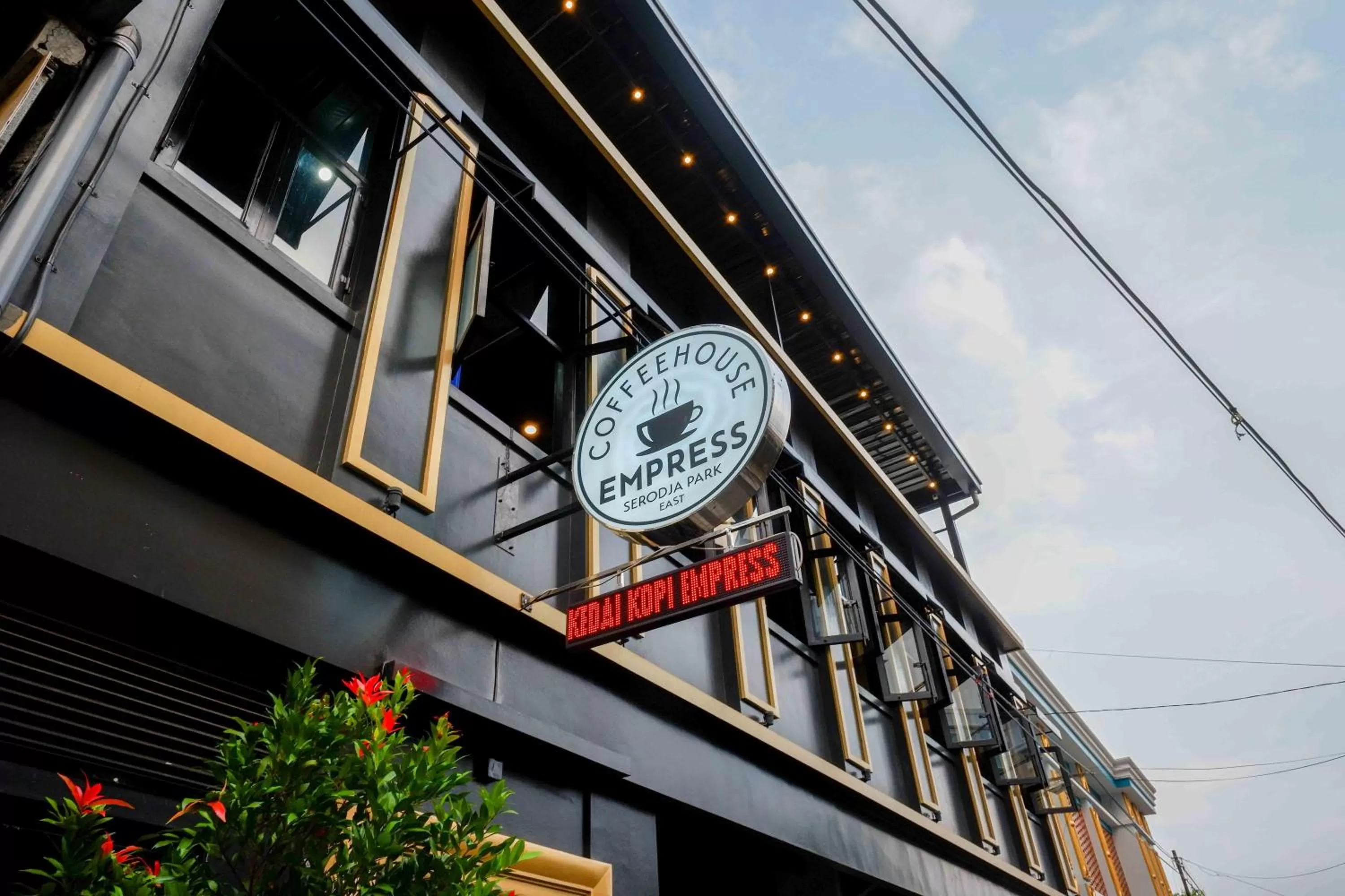 Property logo or sign in Sans Hotel Empress Simpang Lima