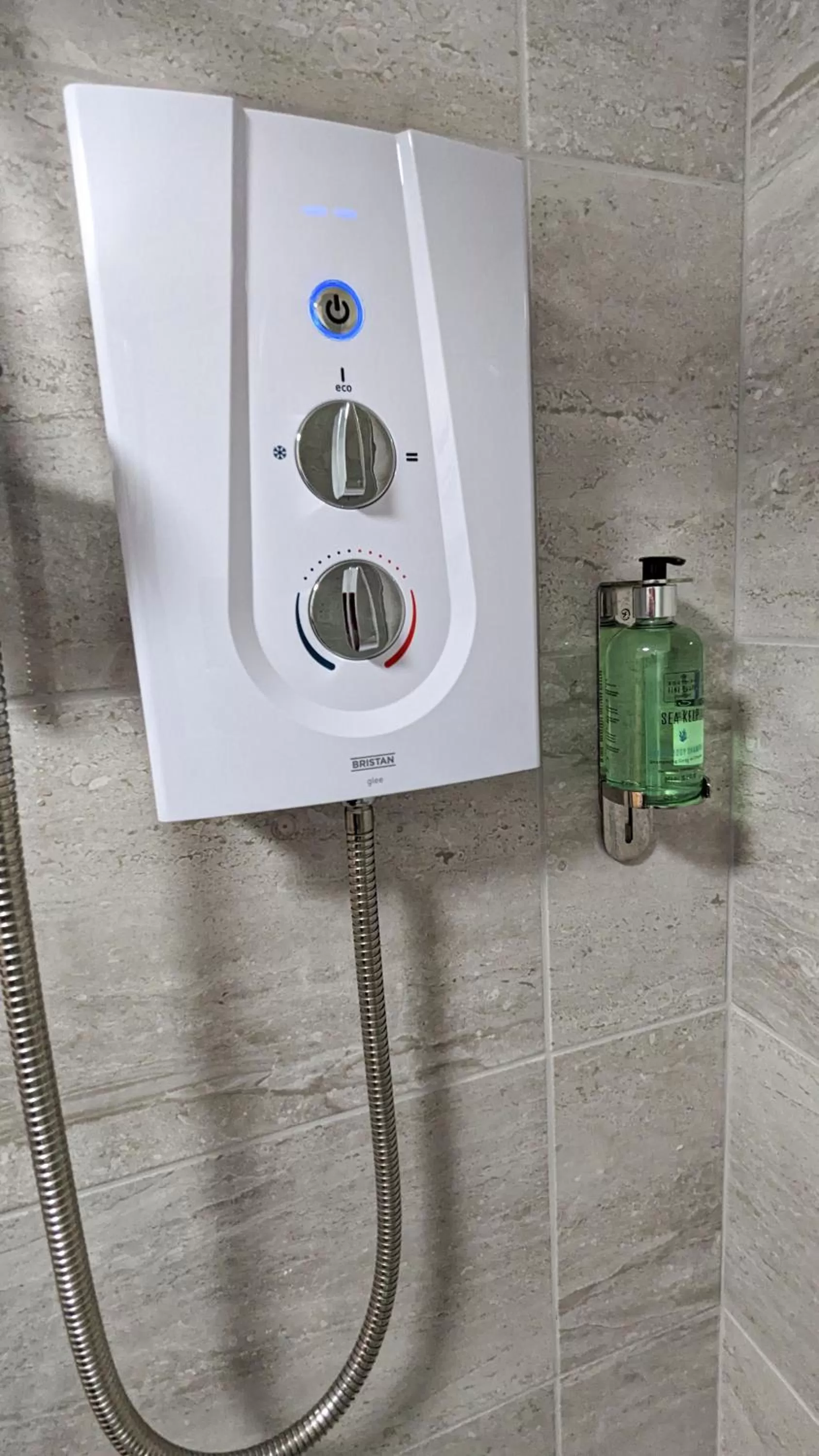 Shower in Cocoon @ International Inn + Apartments