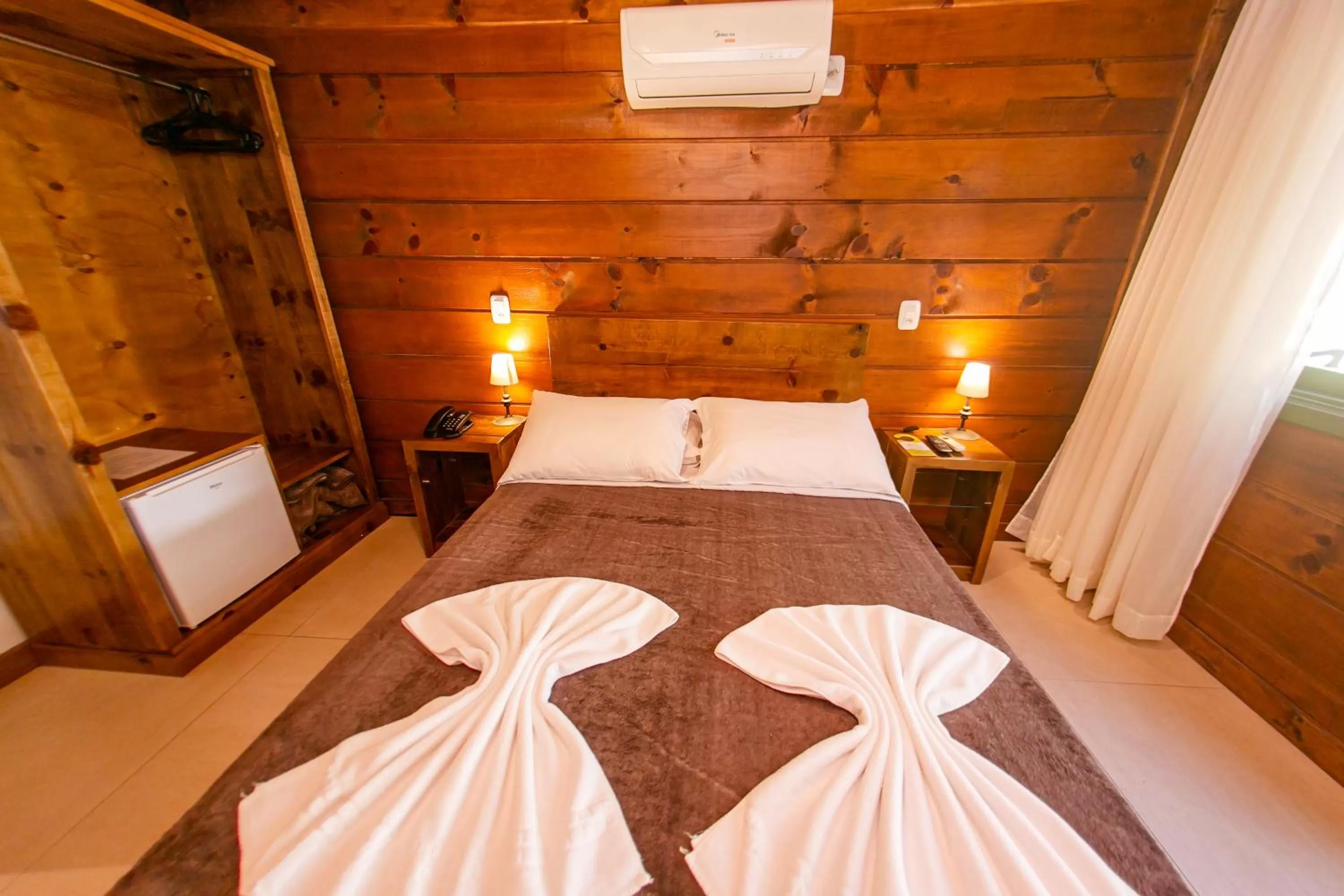 Bed in Pousada Charm Canela