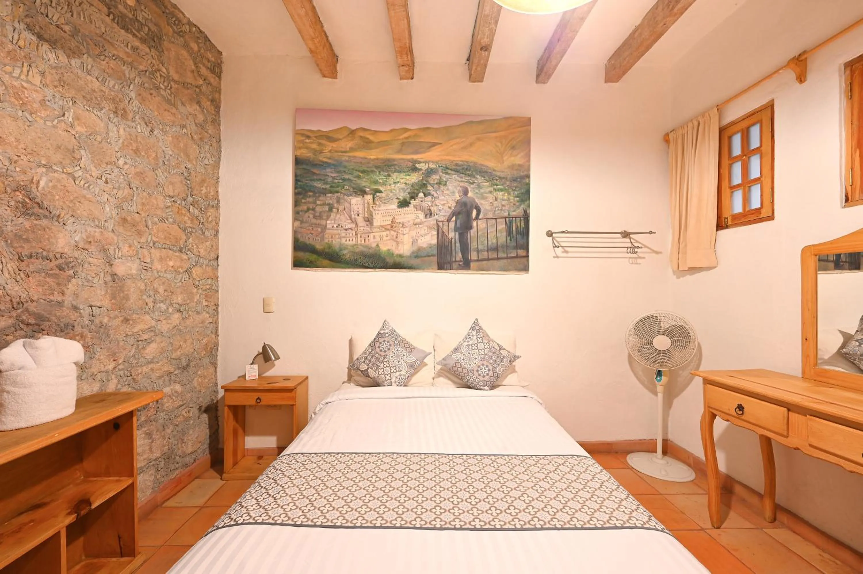 Bed in Hotel Meson Cuevano