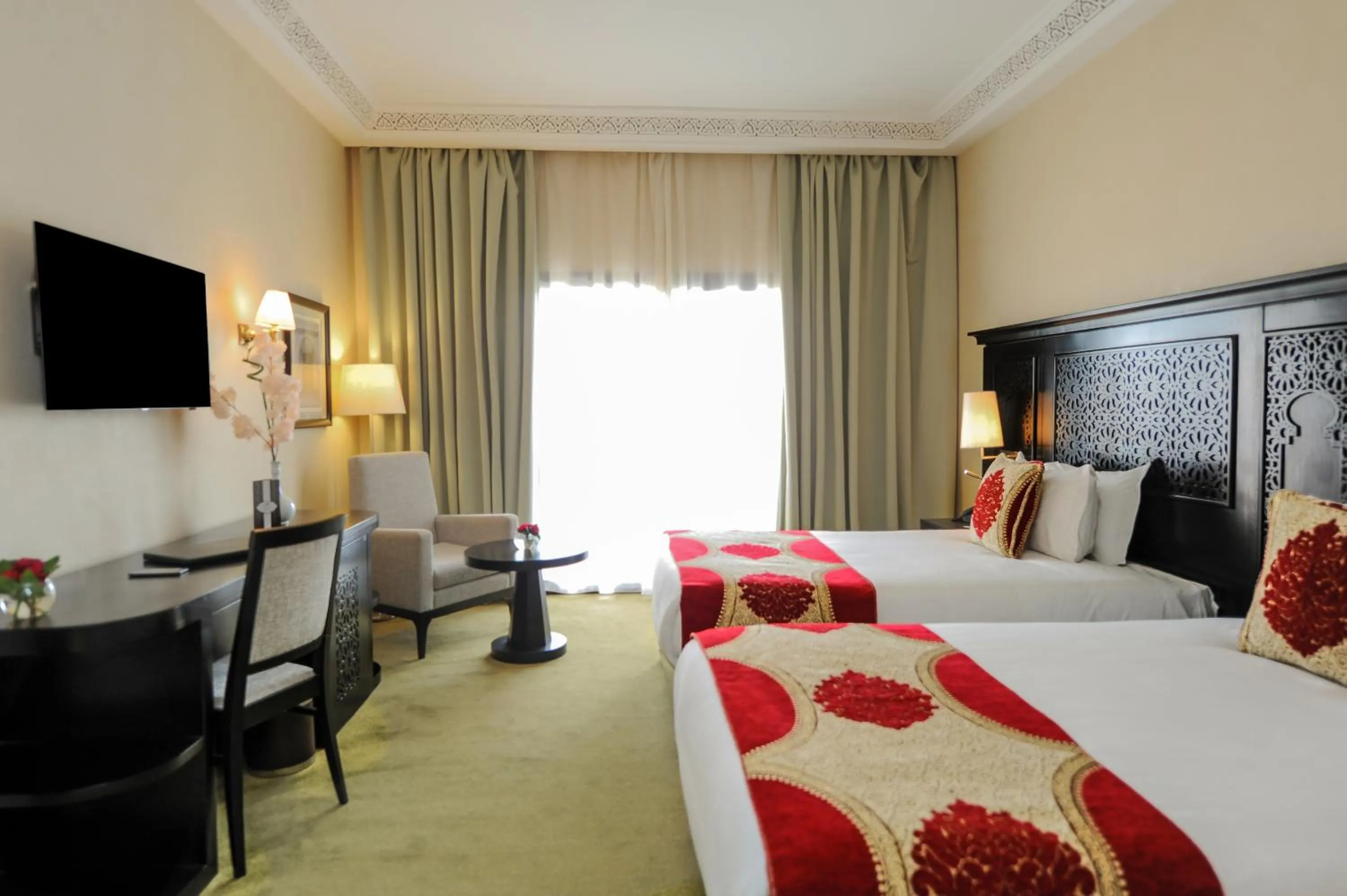 Photo of the whole room, Bed in Ennakhil Marrakech Hotel & SPA