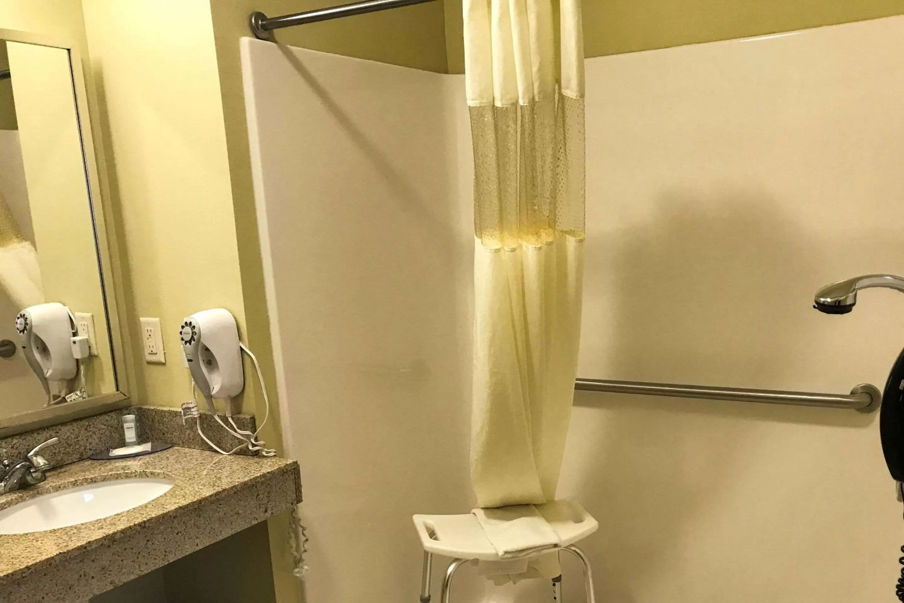 Bedroom in Suburban Studios Cedar Falls