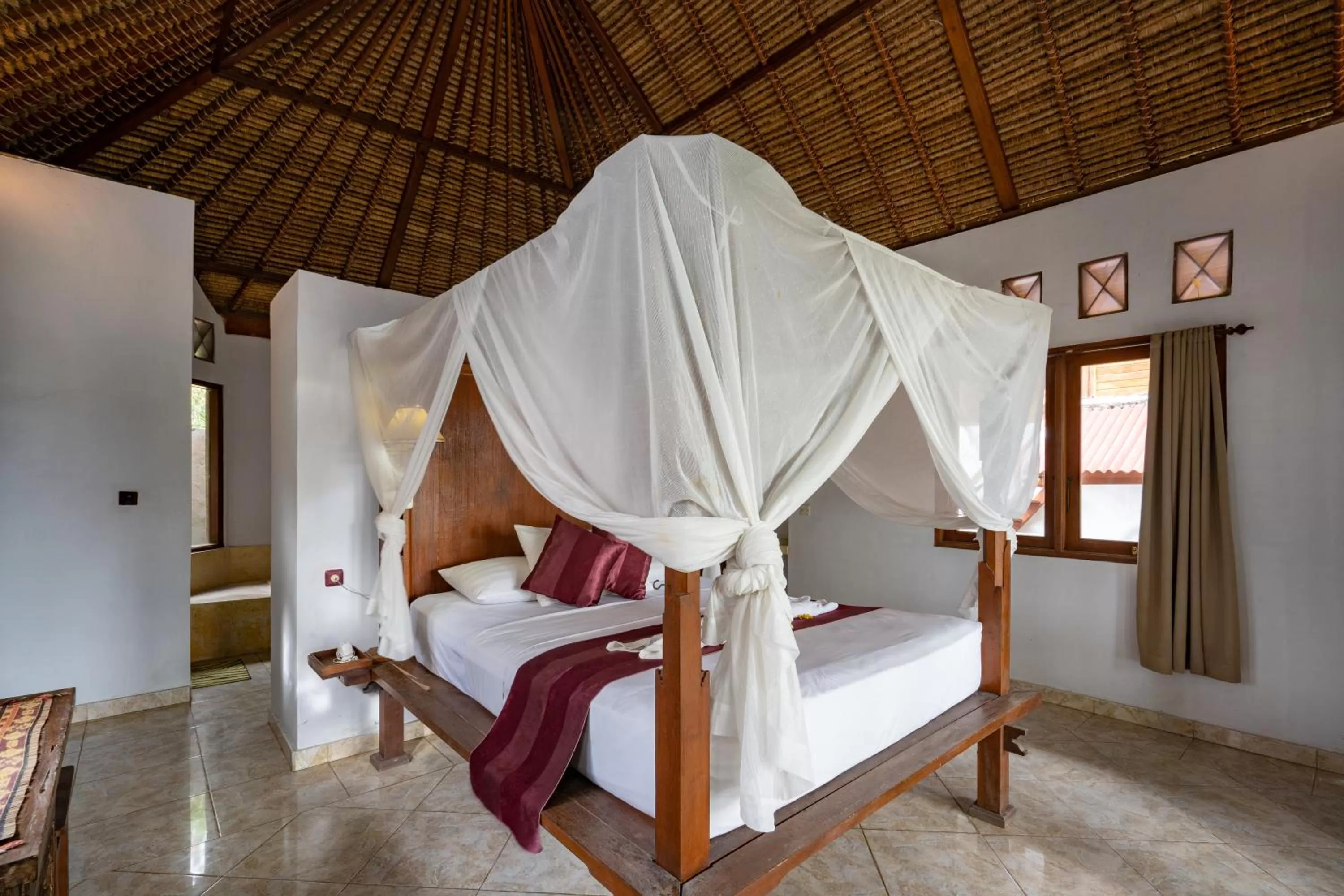Bed in Mushroom Beach Bungalows