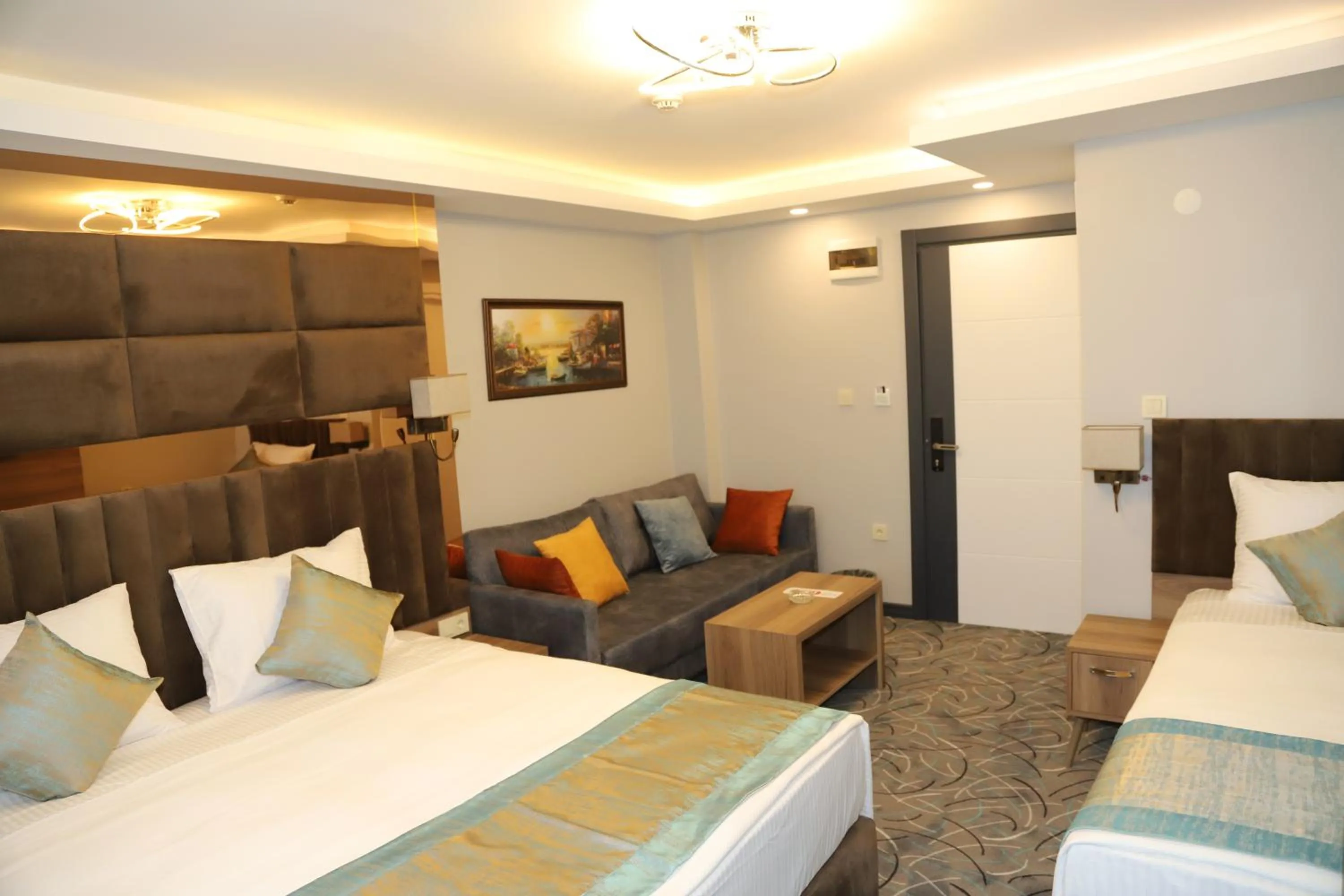 Bed in Grand Kavi Hotel