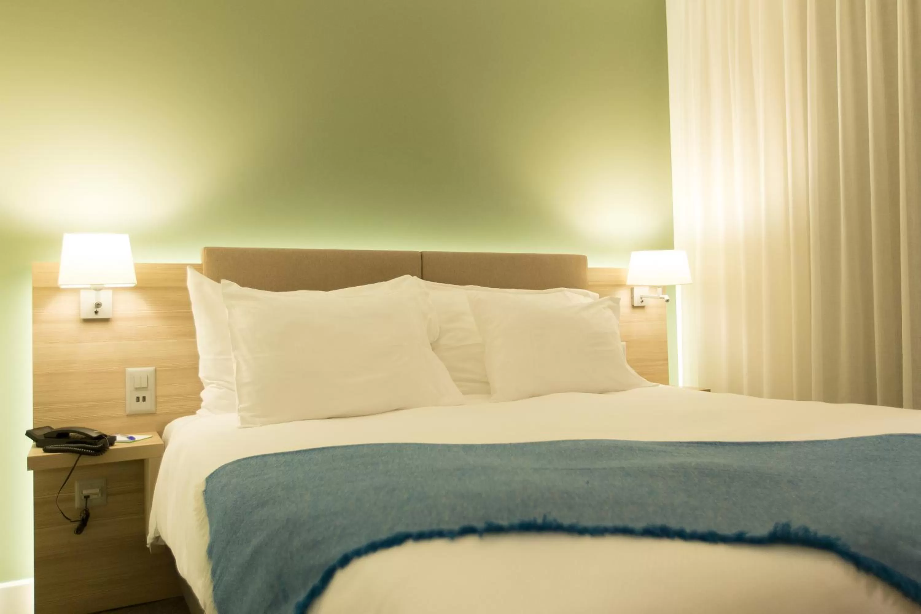 Bed in Hôtel des Voyageurs Boutique