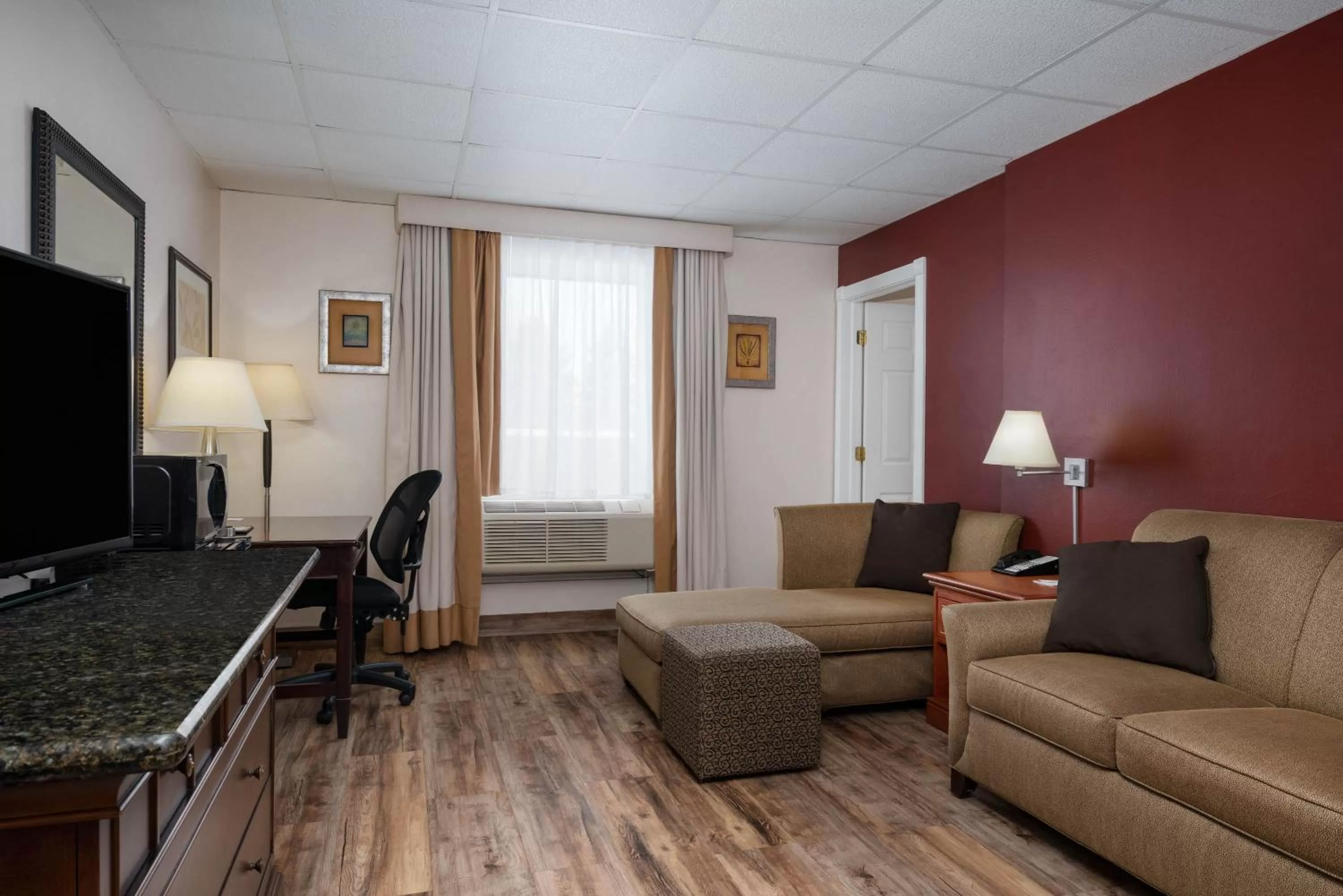 Living room in Ramada by Wyndham Albert Lea