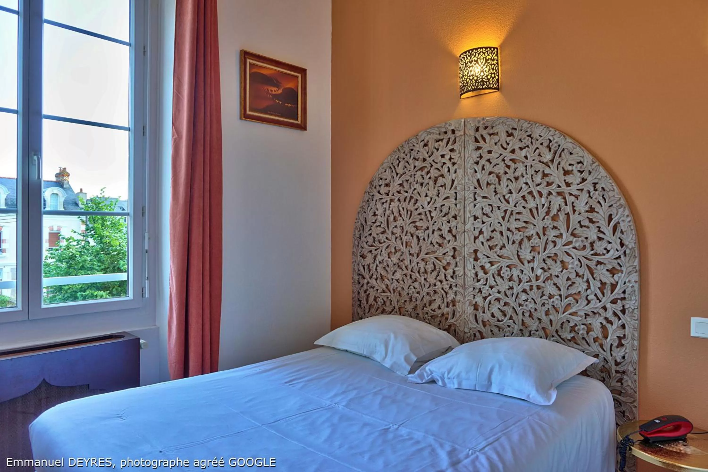 Bed in Hôtel de Bretagne - anciennement Queen Serenity Hotel