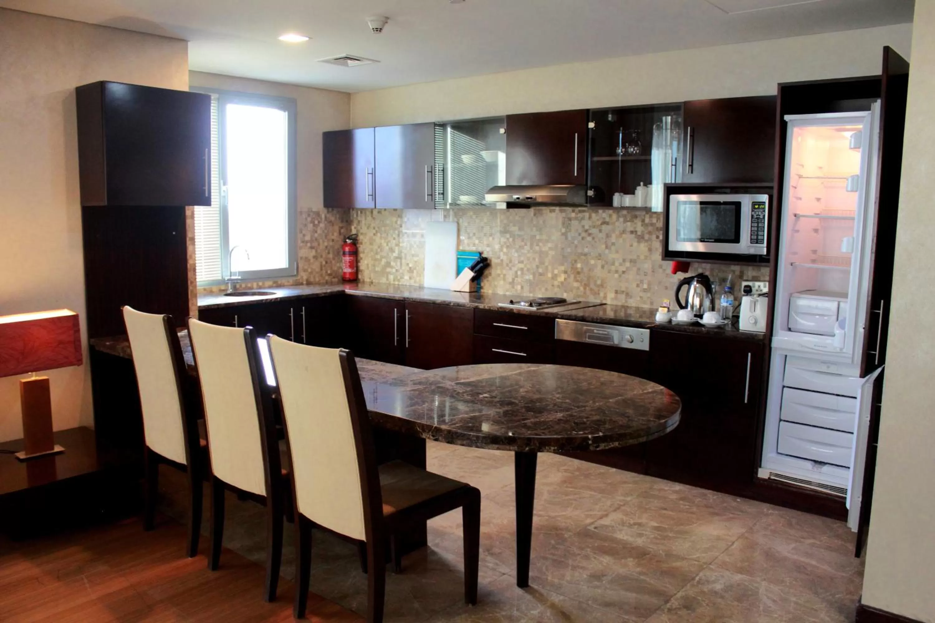 Kitchen or kitchenette in Tulip Creek Hotel Apartments