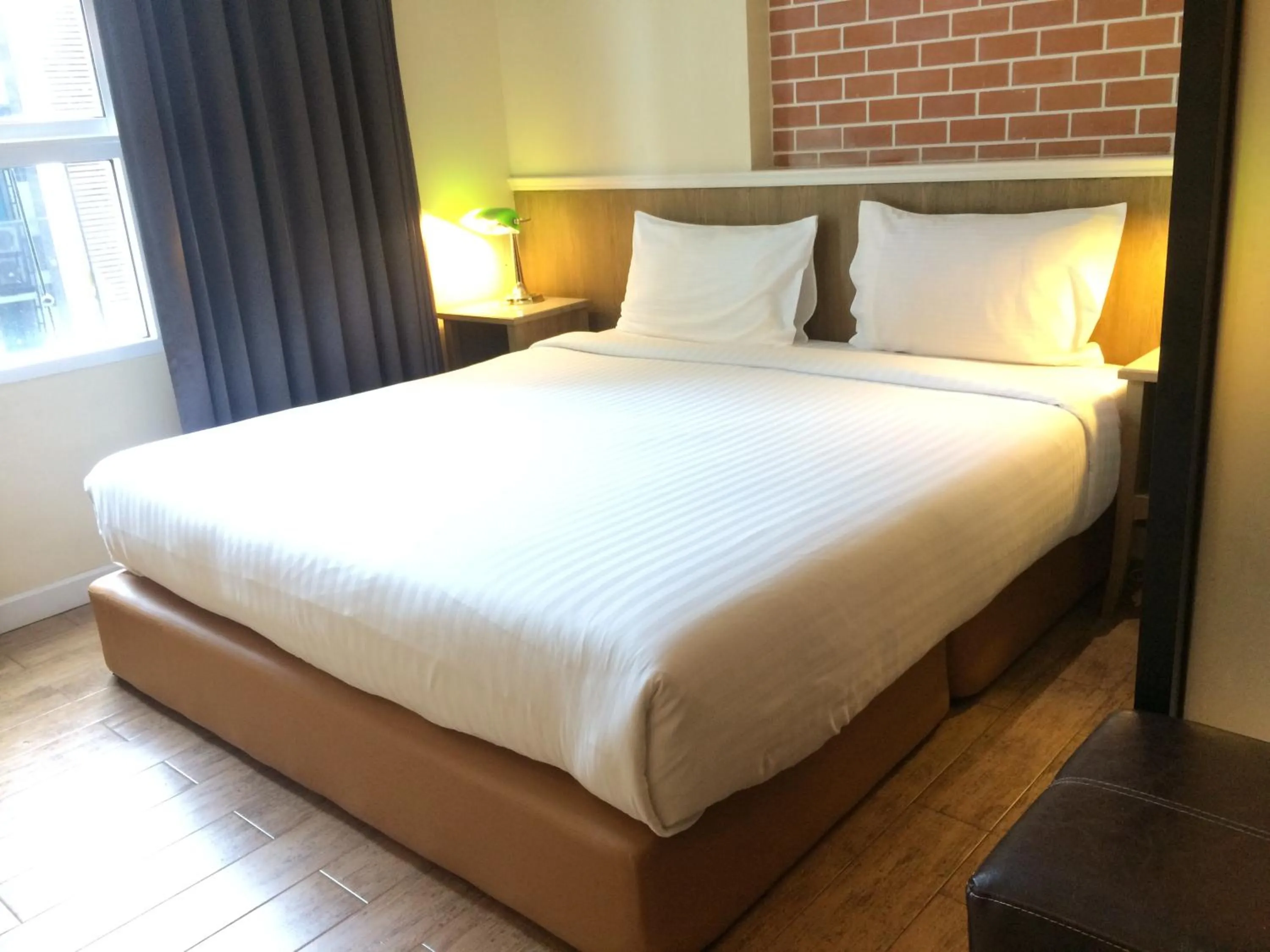 Bed in Bourbon St. Boutique Hotel