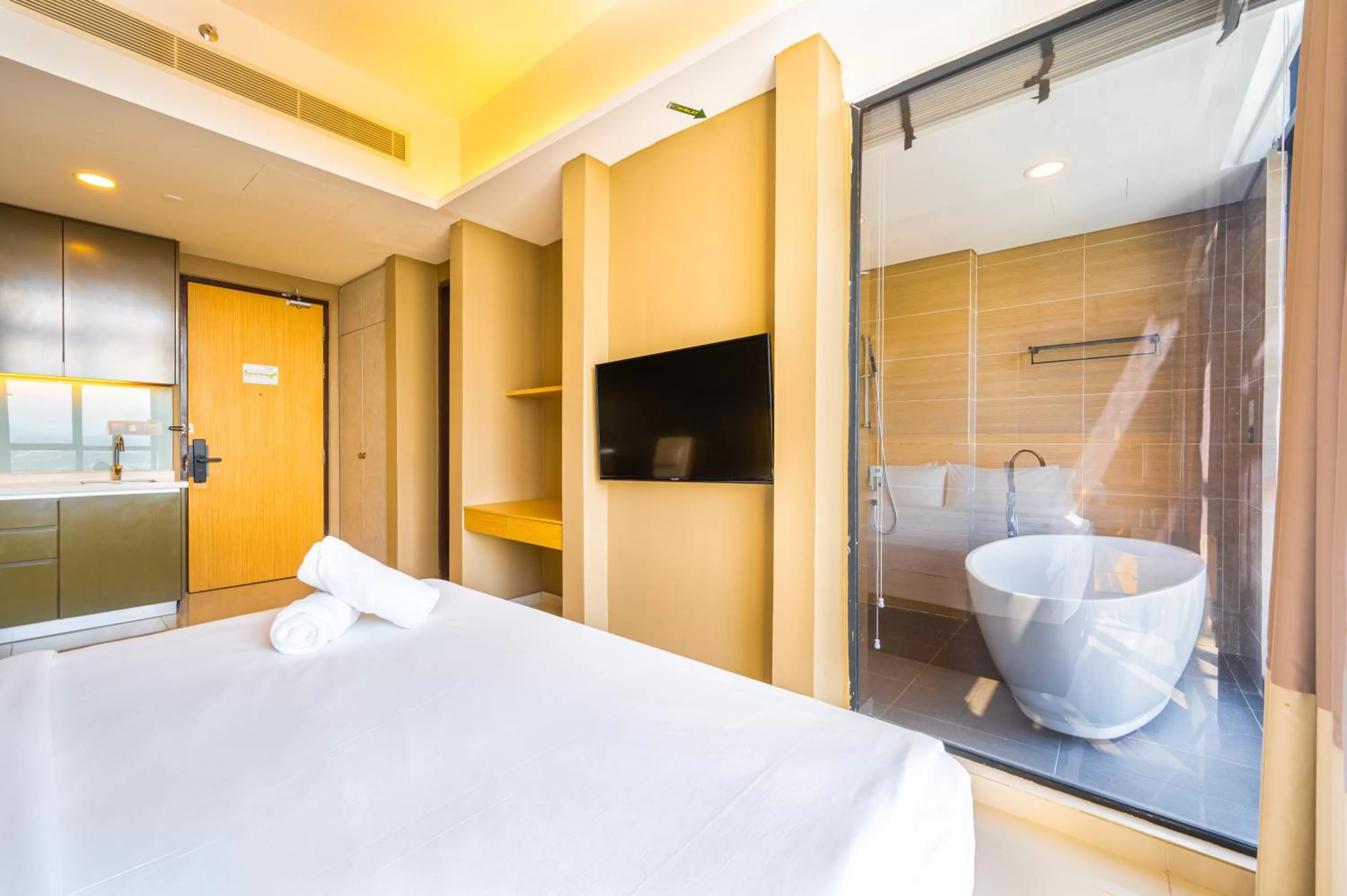 Bed in Greystone 99 Suites