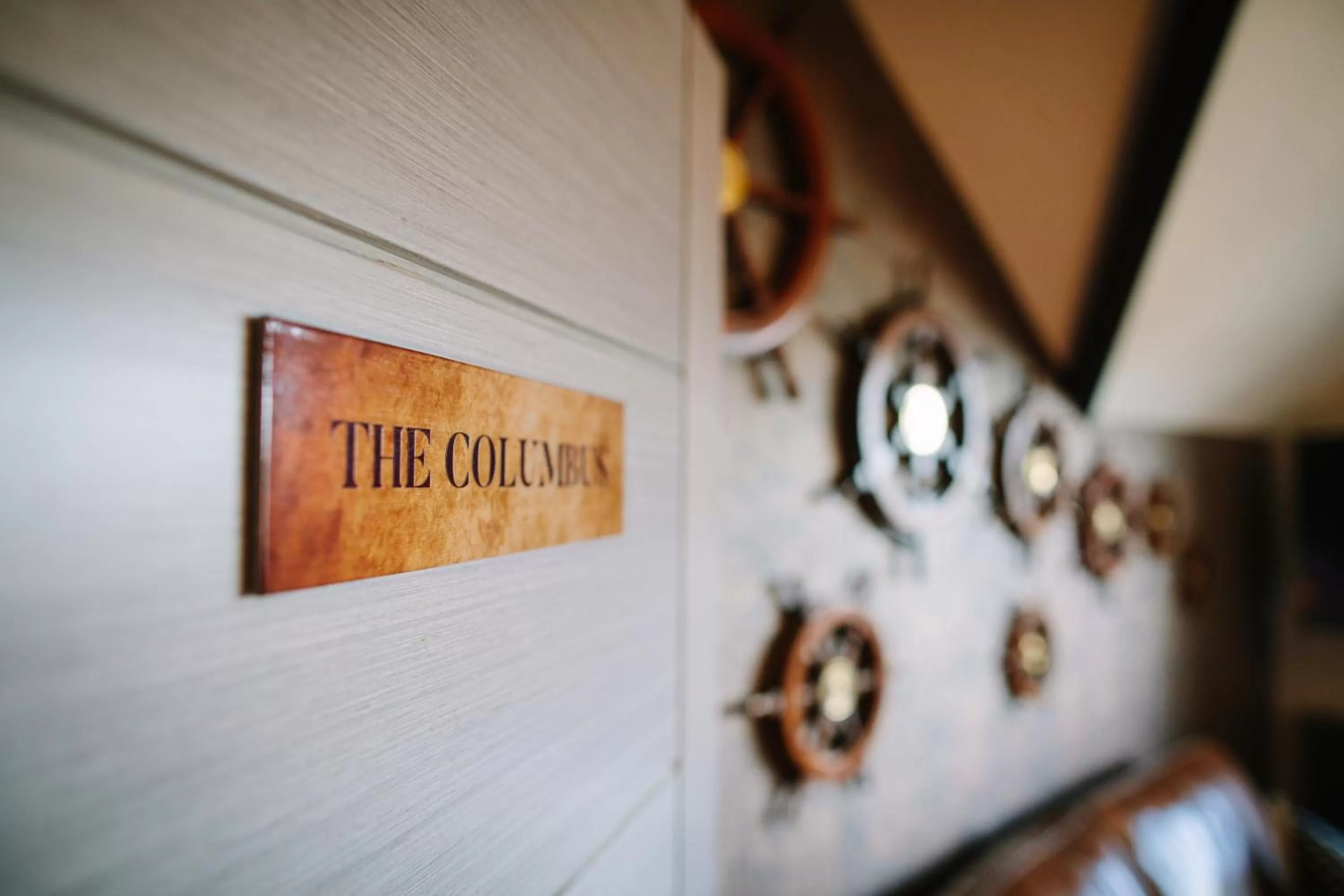 Property logo or sign in Absoluxe Suites