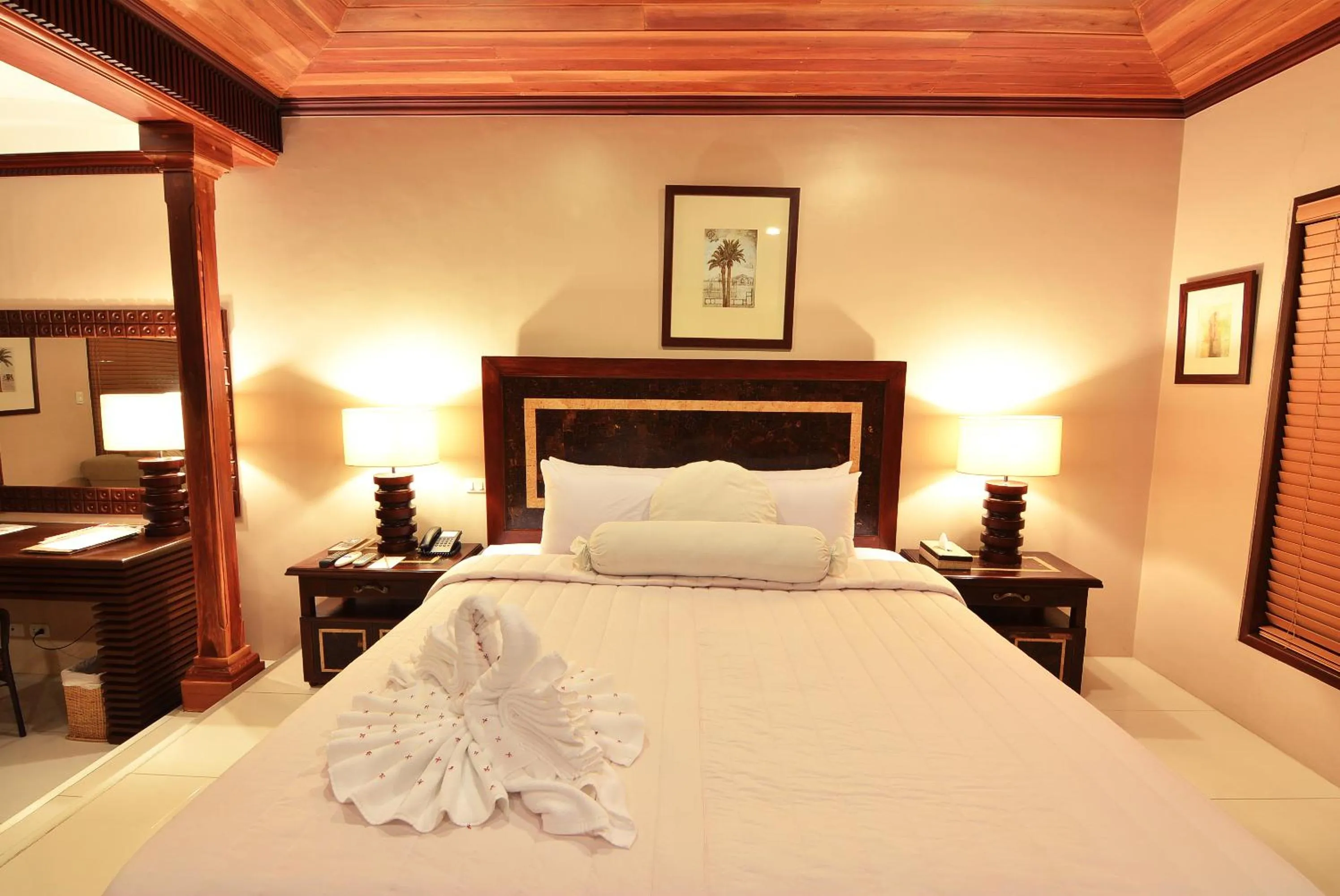 Bed in Citystate Asturias Hotel Palawan