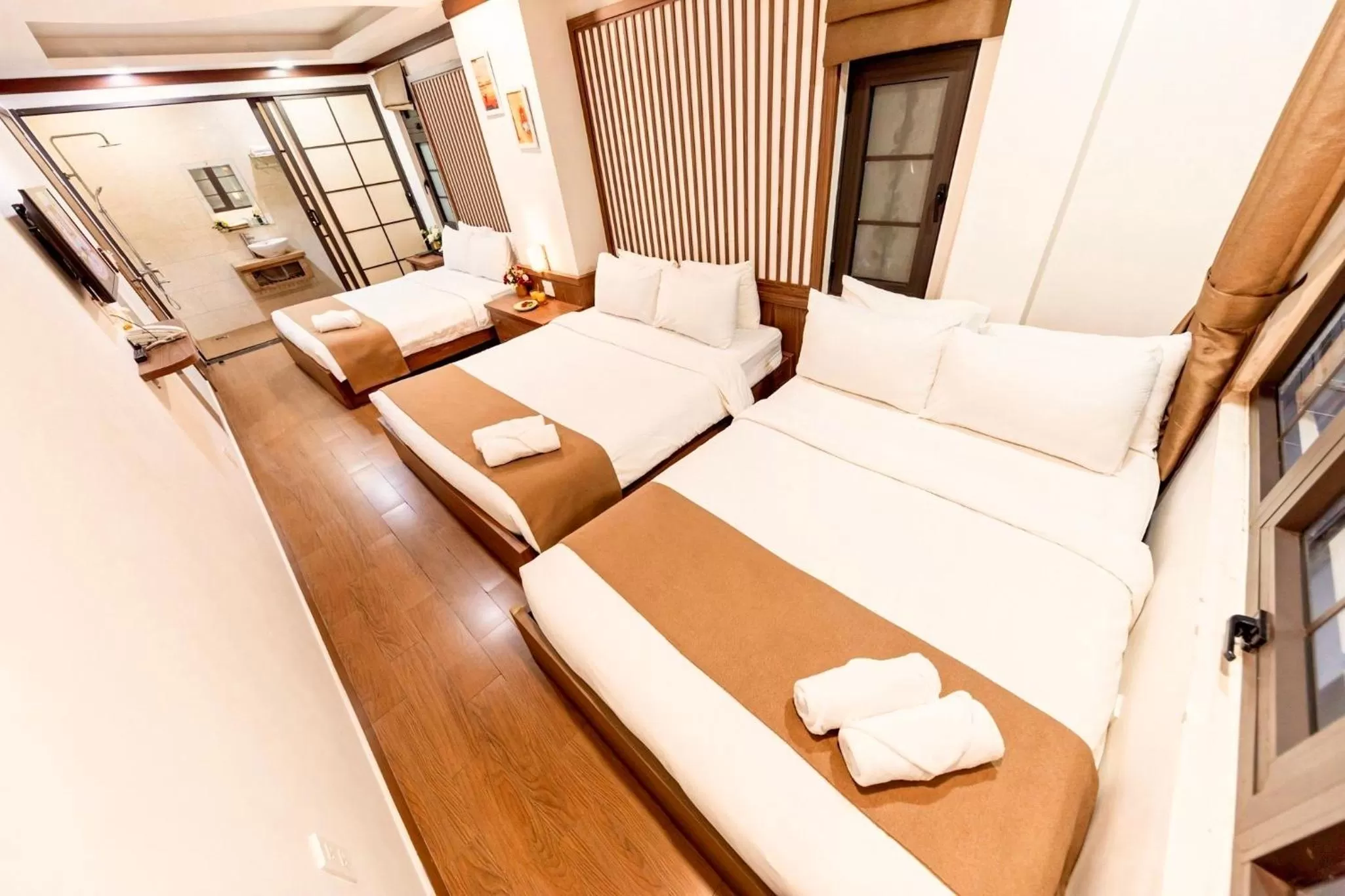 Photo of the whole room, Bed in Khai Ngoc Hotel