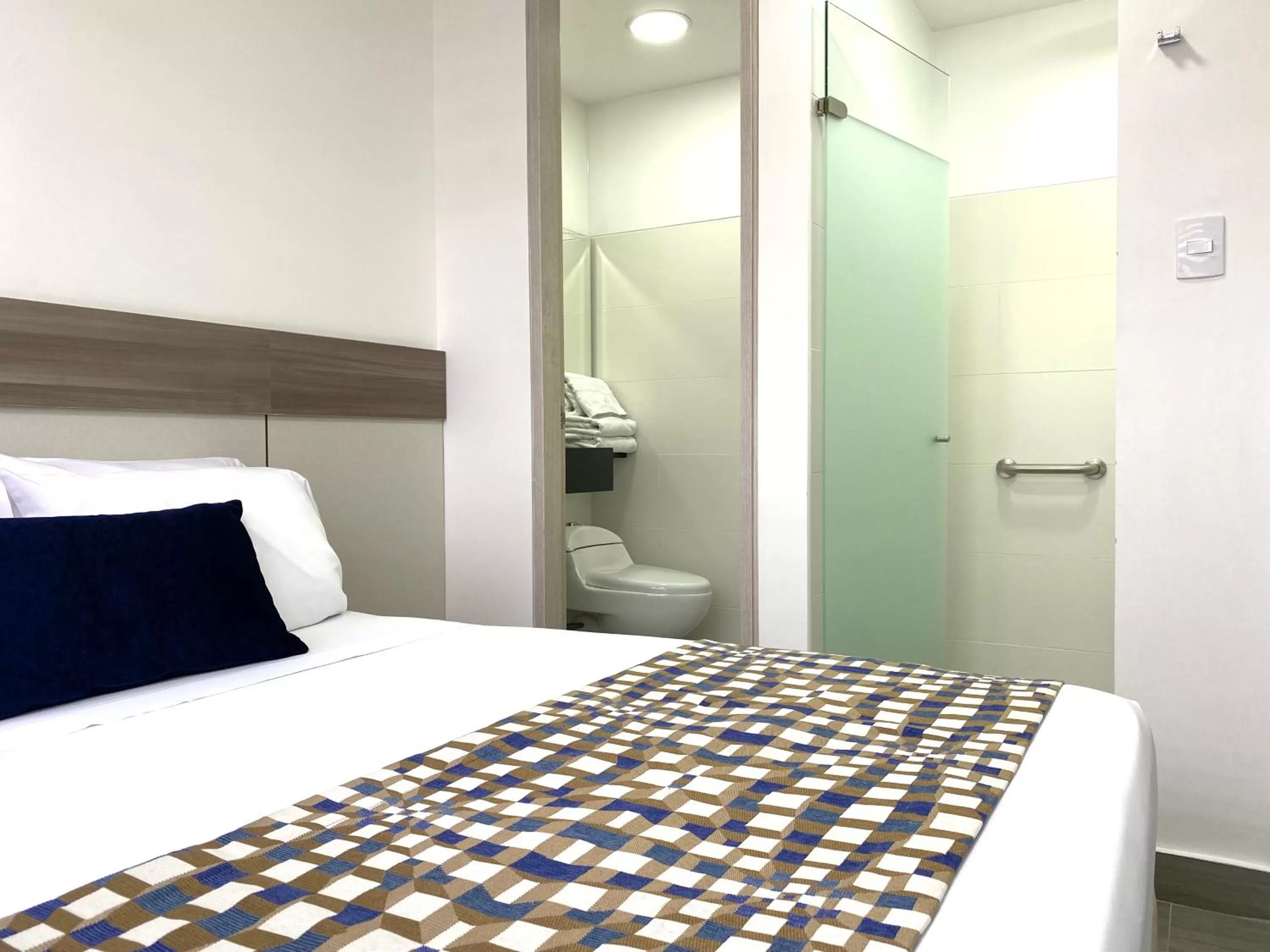 Bed in Seven Inn Hotel