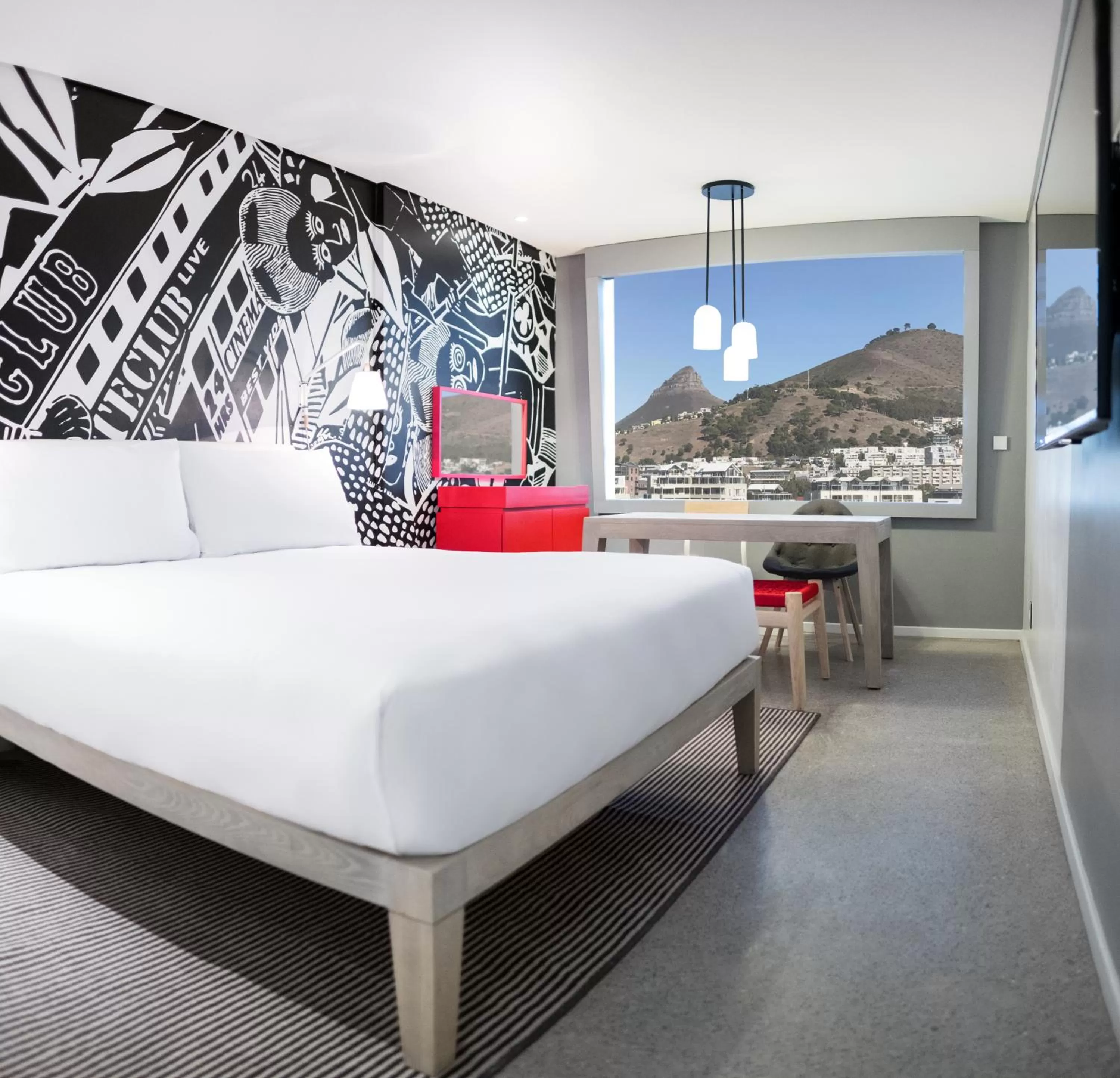 Photo of the whole room, Bed in Radisson RED Hotel V&A Waterfront Cape Town