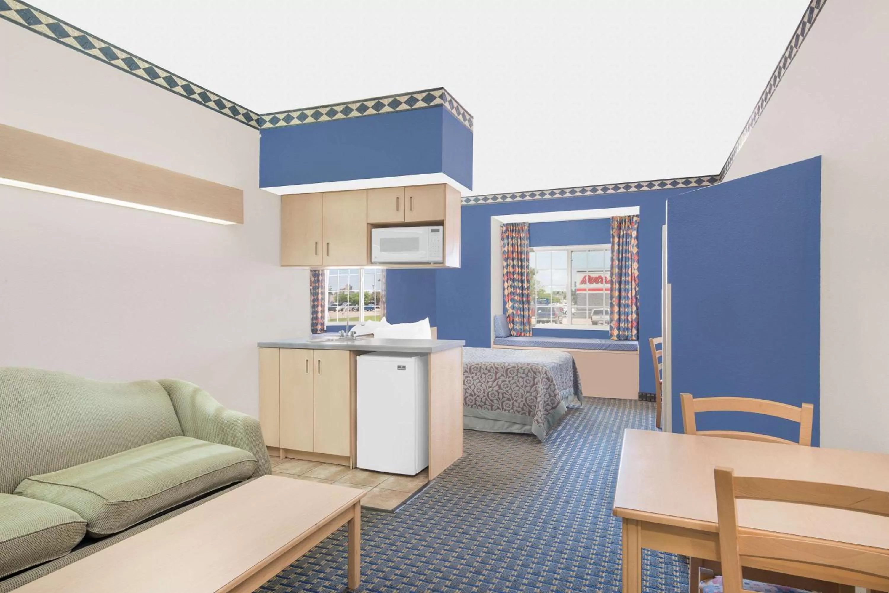 Photo of the whole room, Bed in Days Inn & Suites by Wyndham Hutchinson