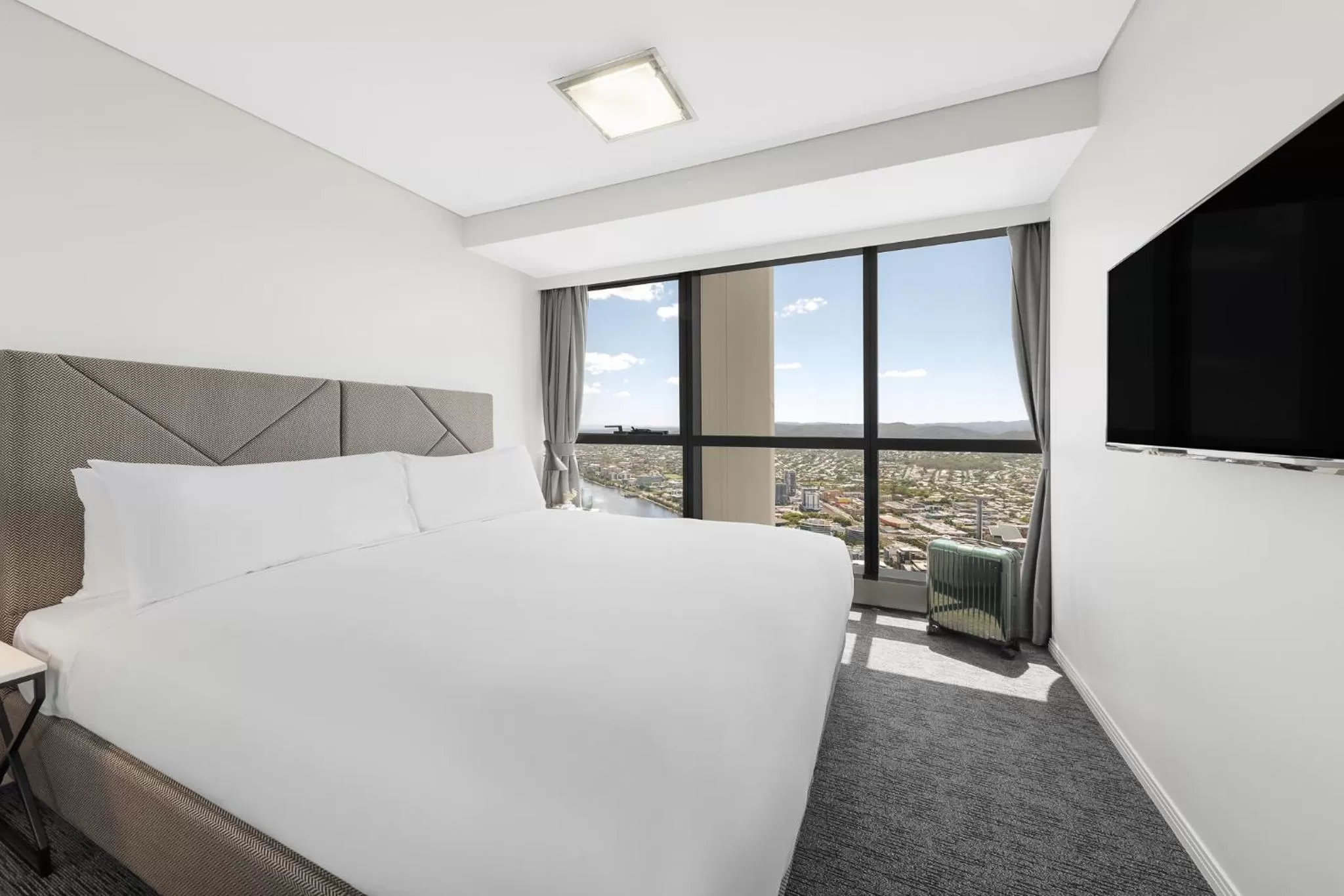 Bed in Meriton Suites Herschel Street, Brisbane