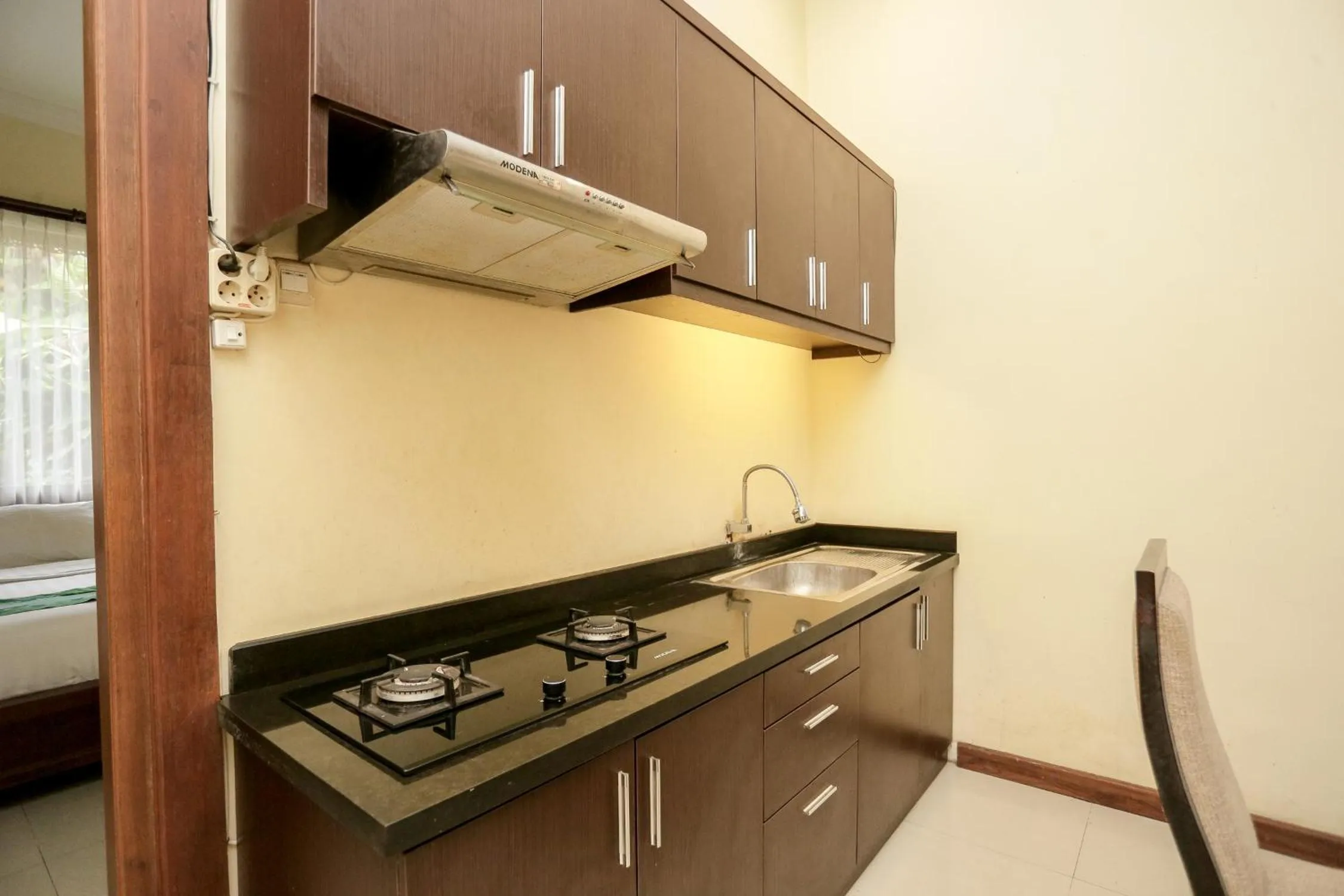 Kitchen or kitchenette in Ubud Hotel & Cottages