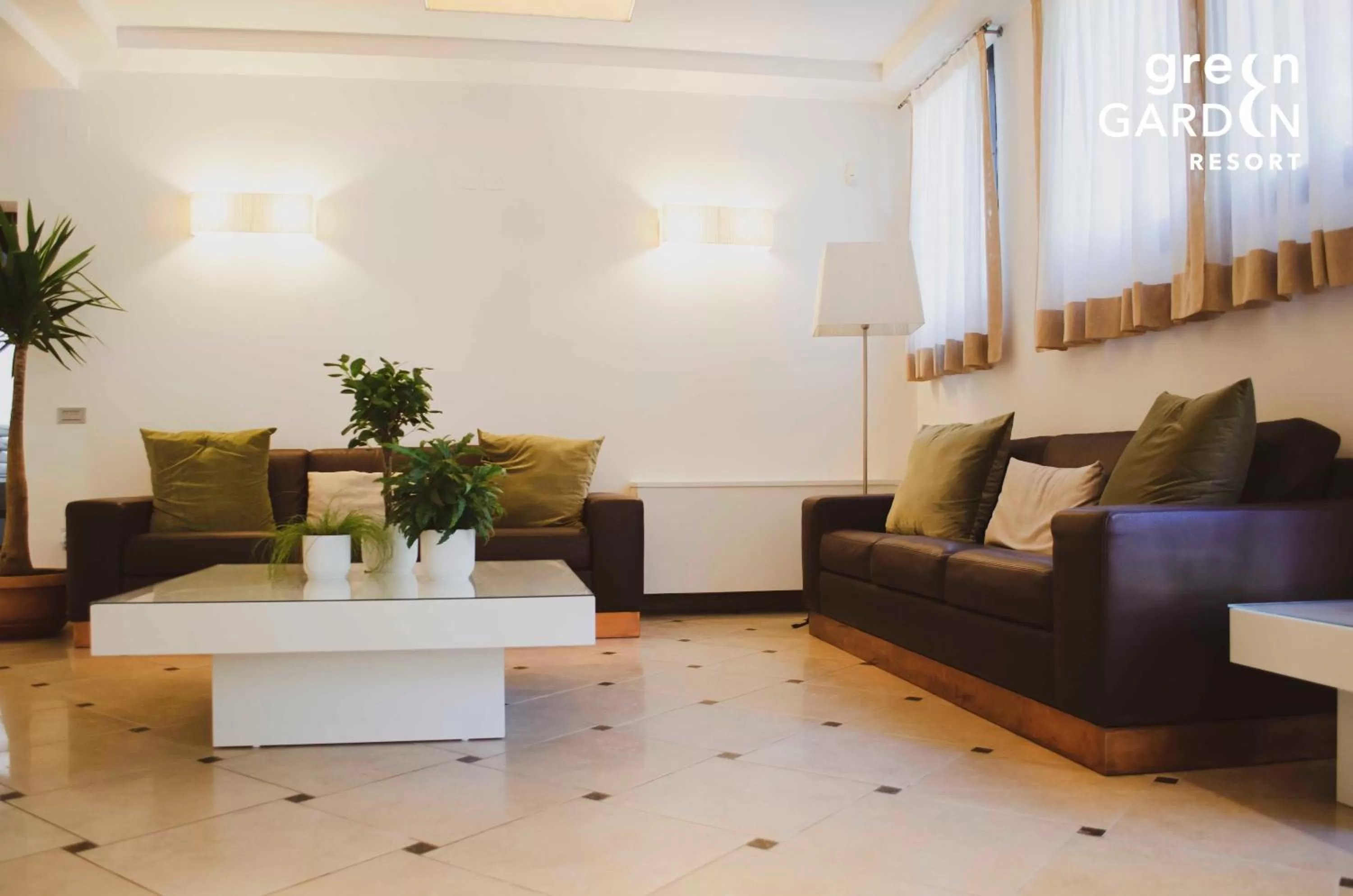 Living room in GREEN GARDEN Resort - Smart Hotel