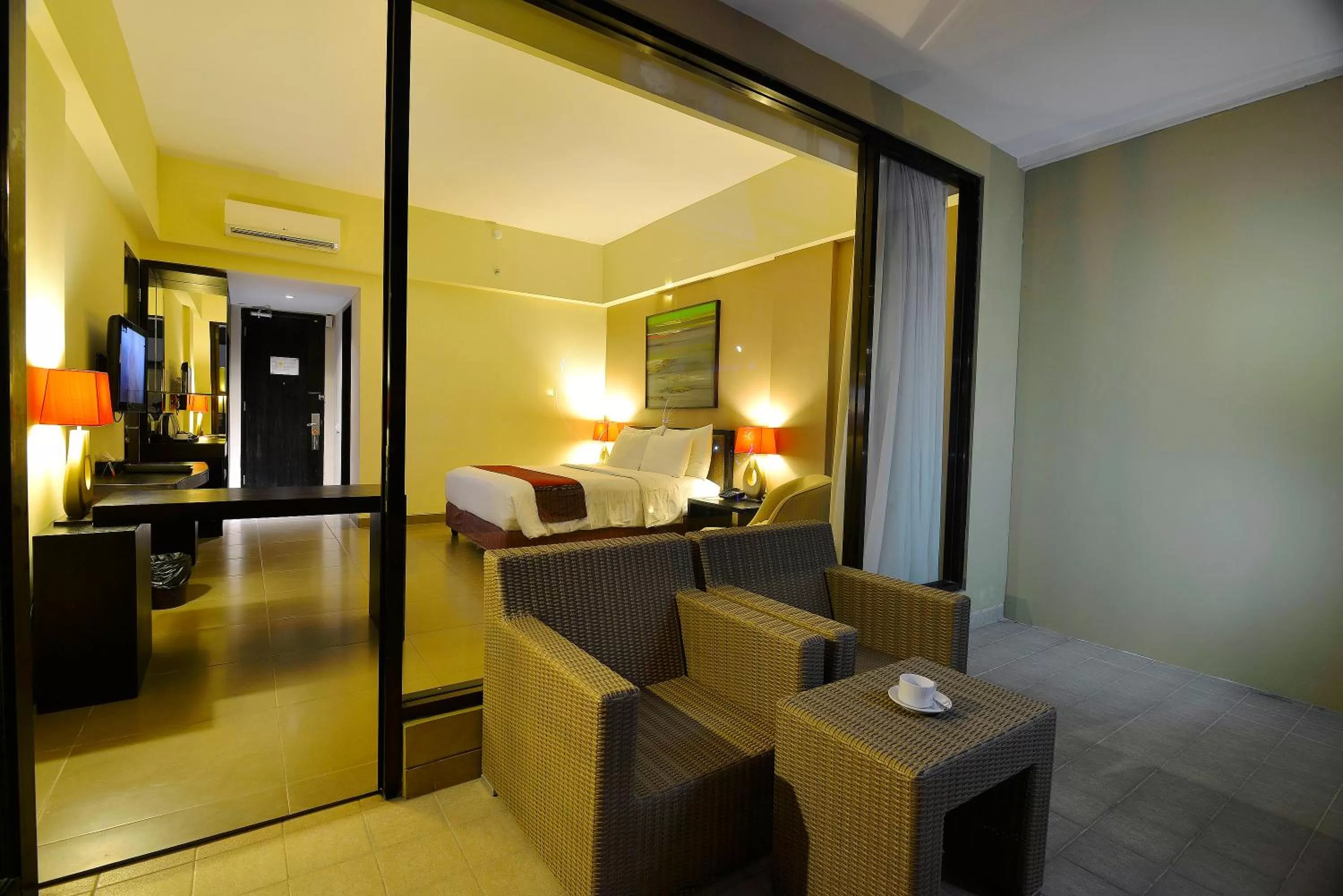 Balcony/Terrace, Bed in 100 Sunset Kuta Hotel & Ballroom