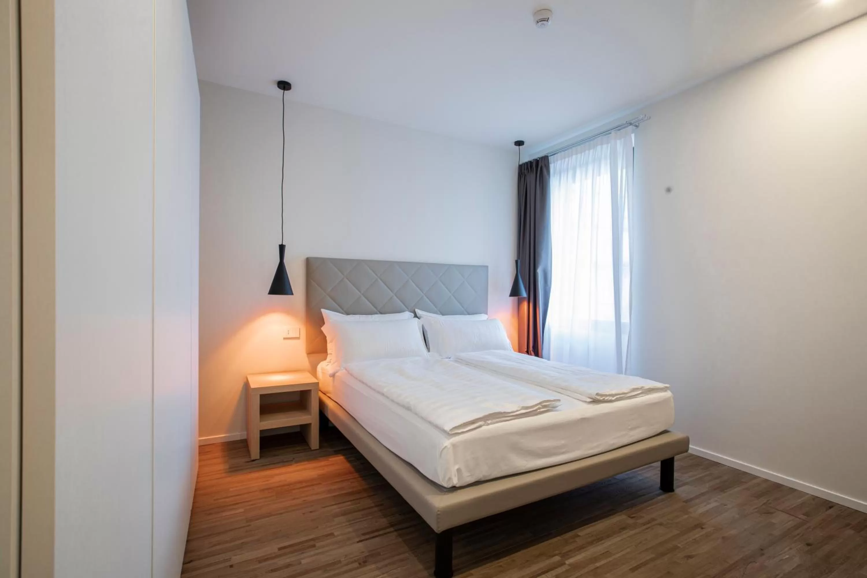 Bed in Ah Villaglori Boutique Apartments