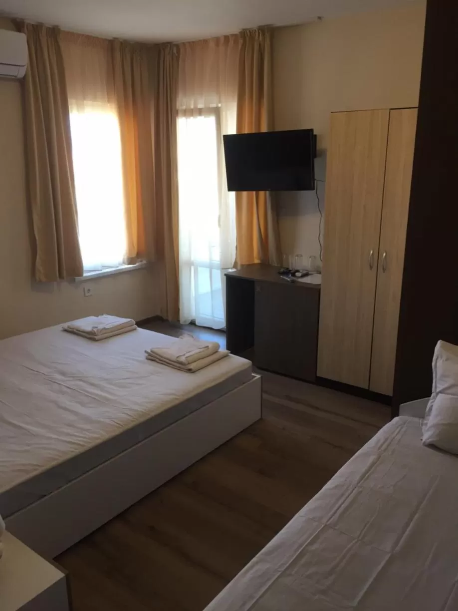 Bed in Family Hotel Malibu