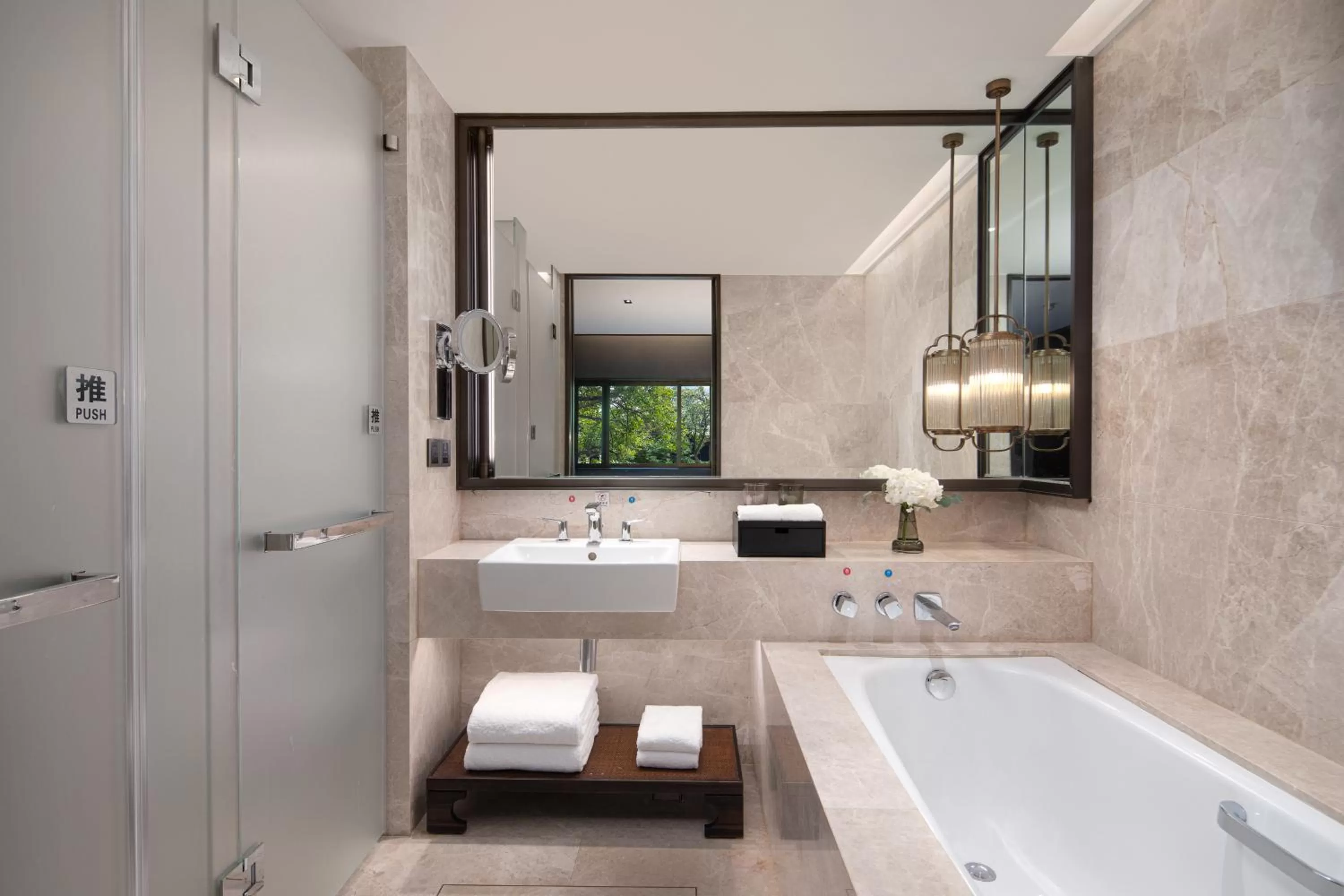 Bathroom in HUALUXE Xi'an Tanghua by IHG